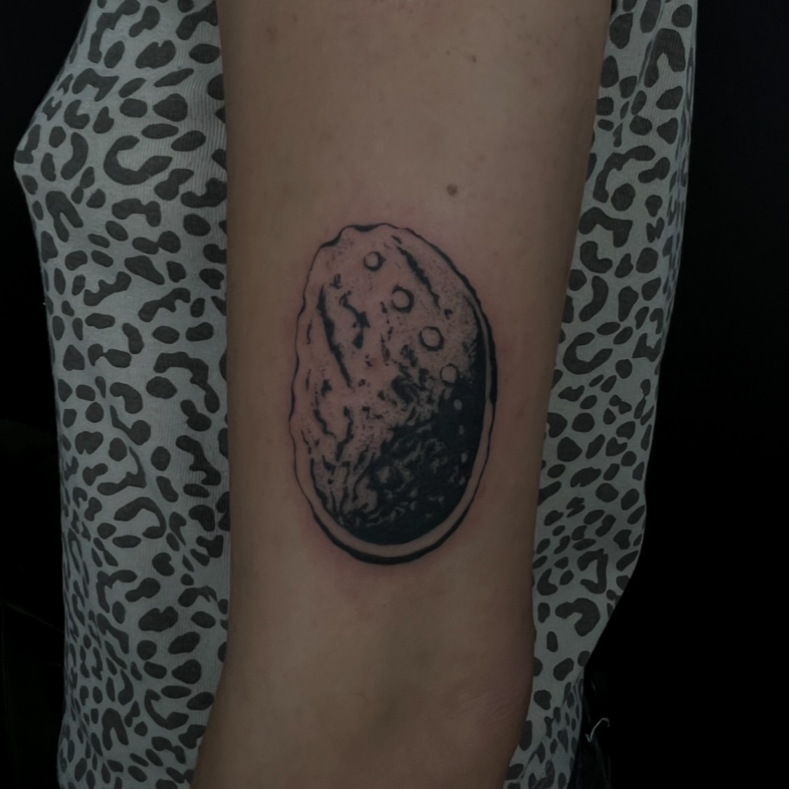 Yin-yang dotwork tattoo on the forearm by lela
