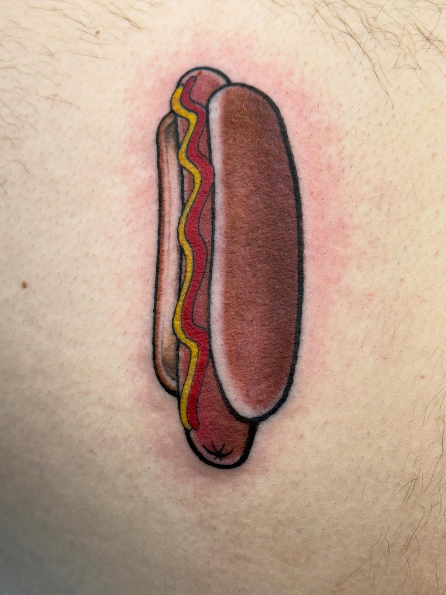 Hot dog American traditional tattoo on the thigh by Aaron Hassler, Nashville, Tennessee