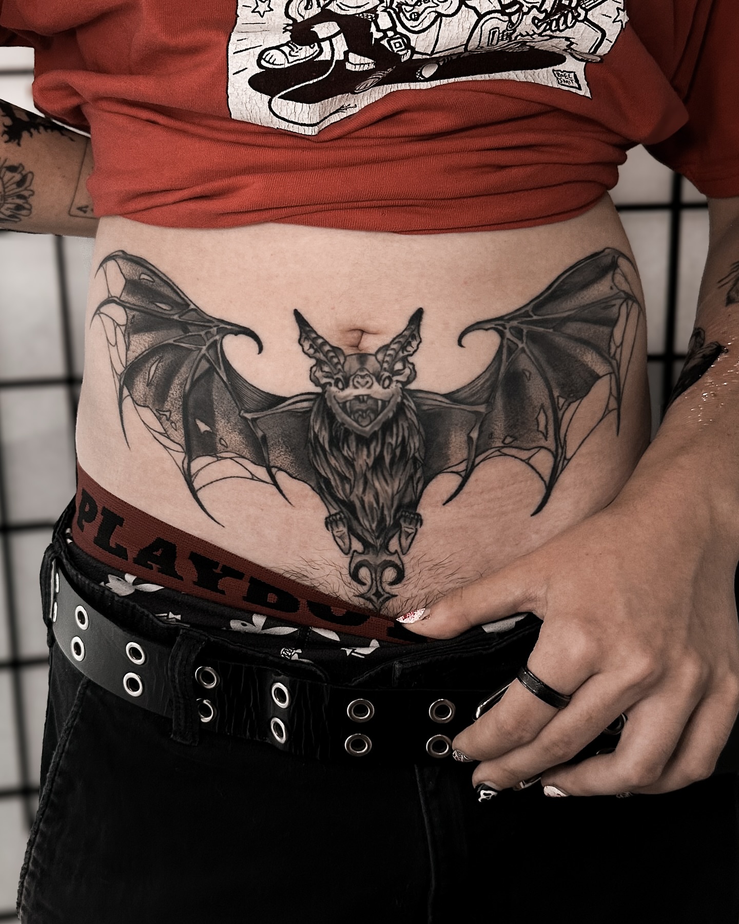 Bat black and grey tattoo on the torso by Taylin Johnson- Illustrative Blackwork, Columbus, Ohio