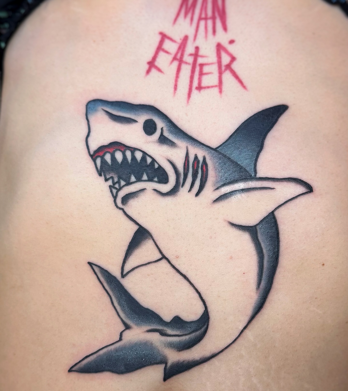 Shark American traditional tattoo on the shoulder by David Gray