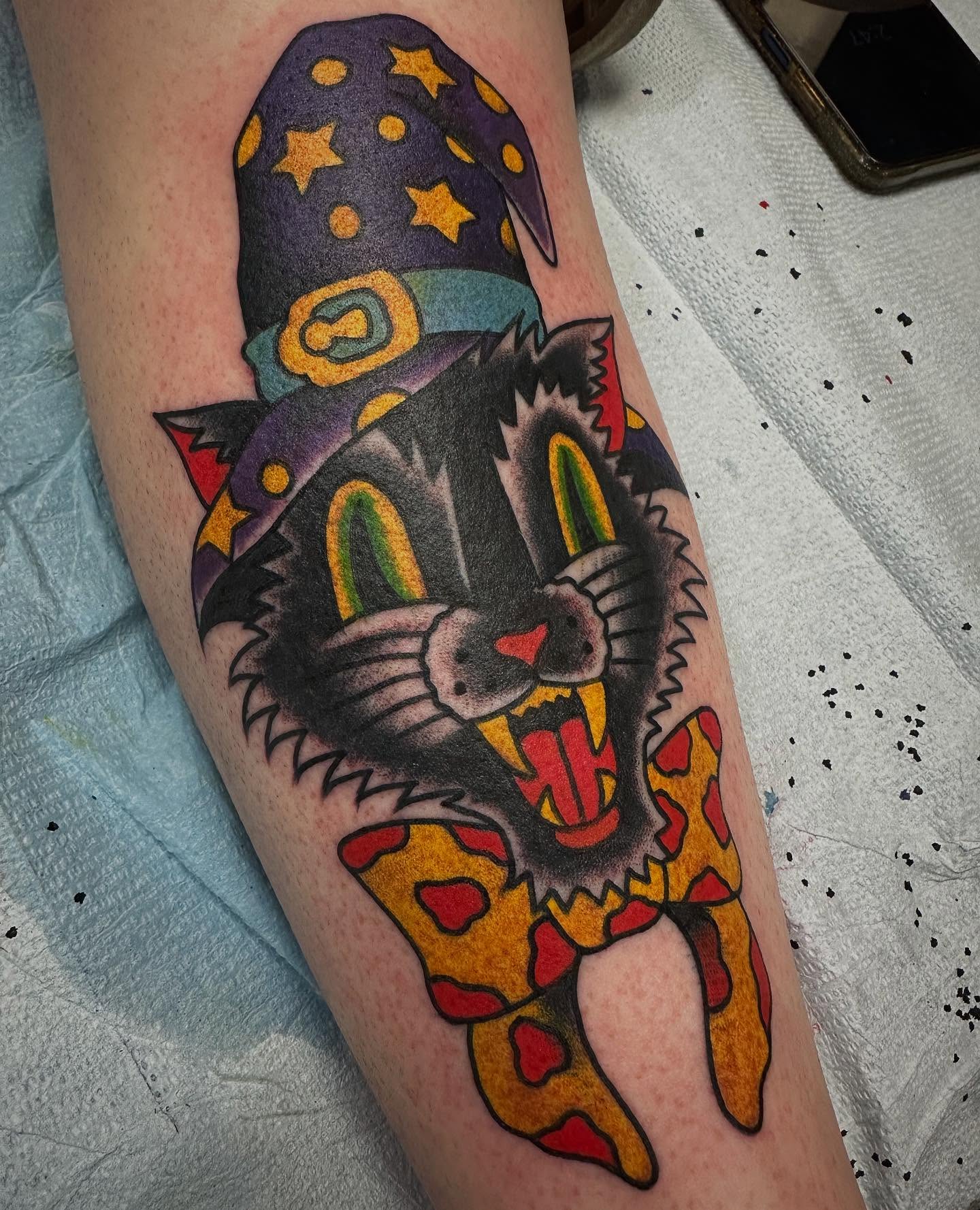 Cat wizard American traditional tattoo on the forearm by Devin Spenny