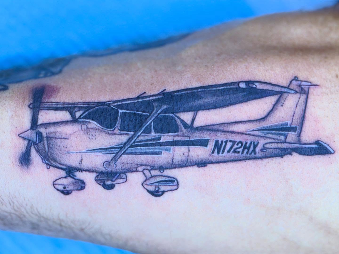 Cessna airplane black and grey tattoo on the forearm by Aaron Hassler, Nashville, Tennessee