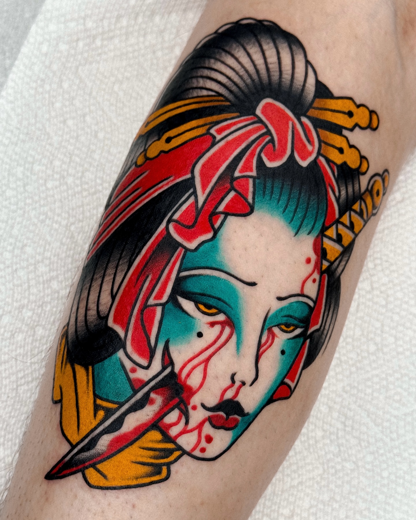 Geisha American traditional tattoo on the forearm by Samuel Dickey