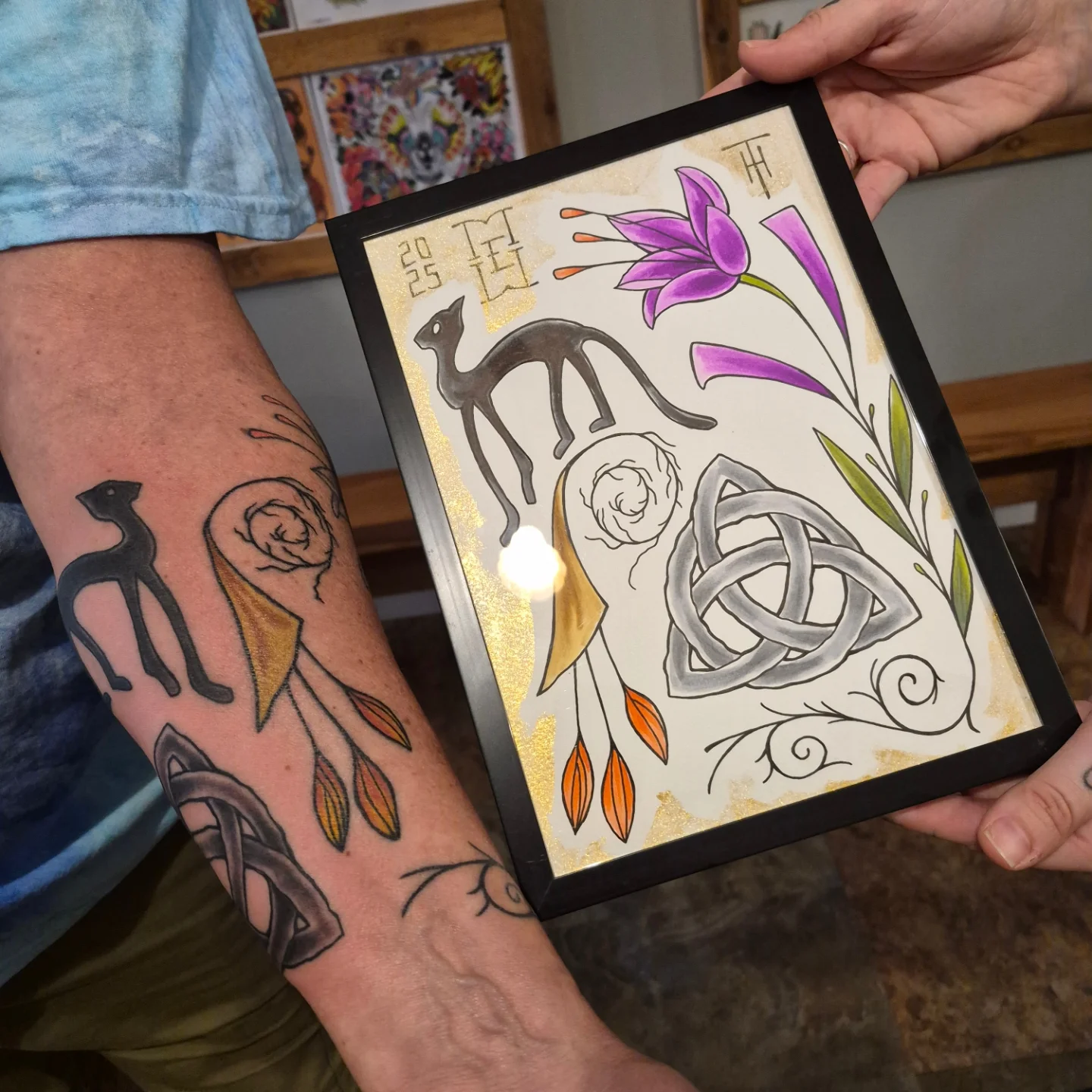 Camel and lily geometric tattoo on the forearm by Matt Williamson