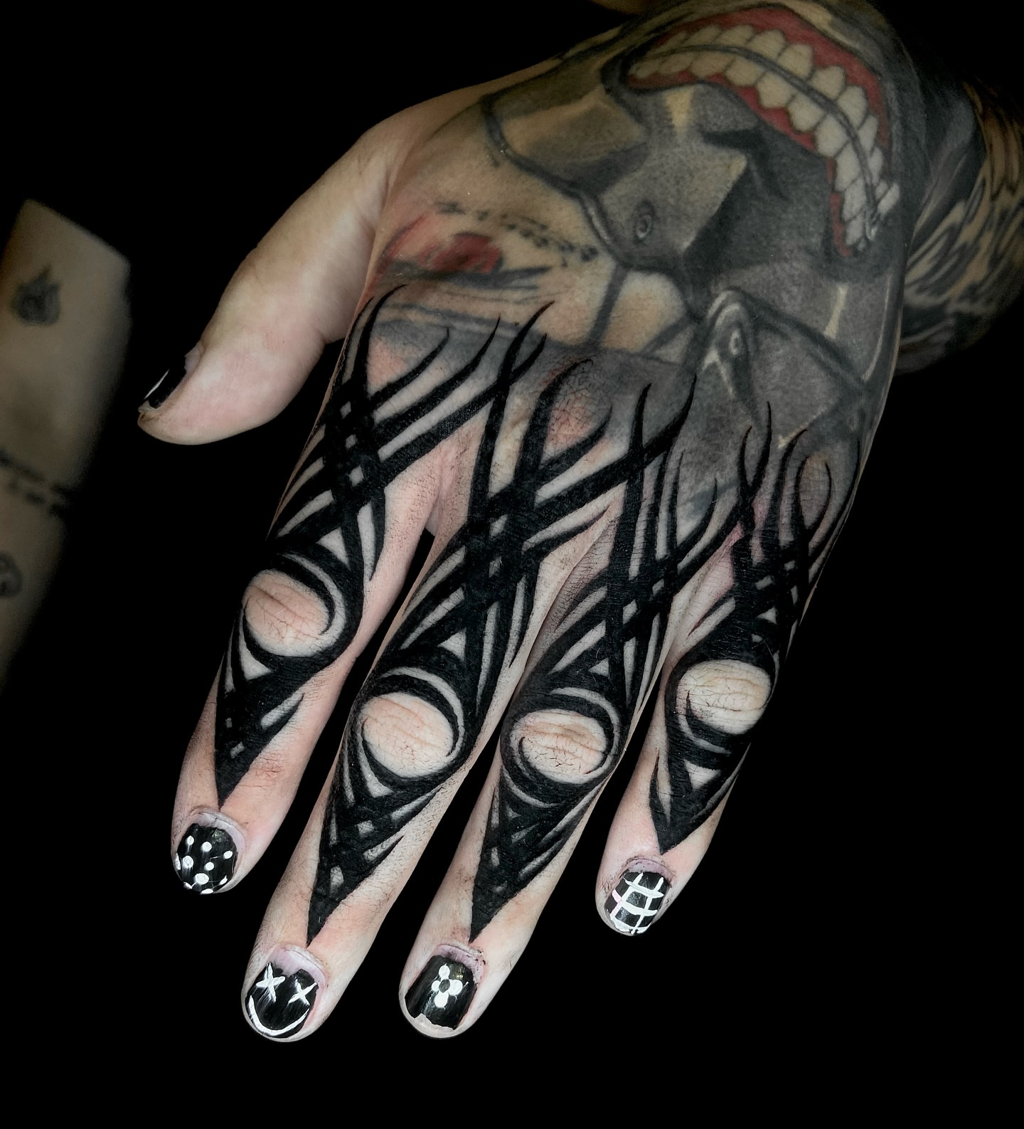 Tribal hand tribal tattoo on the hand by Nathan
