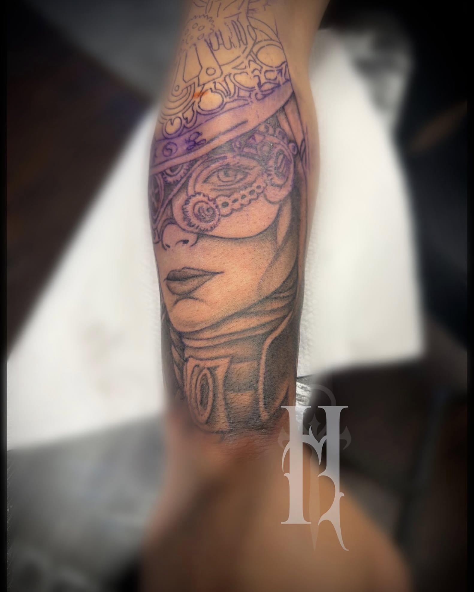 Woman wearing mask realism tattoo on the forearm by Tattoos by Dan Hatcher Carr, Parma, Ohio