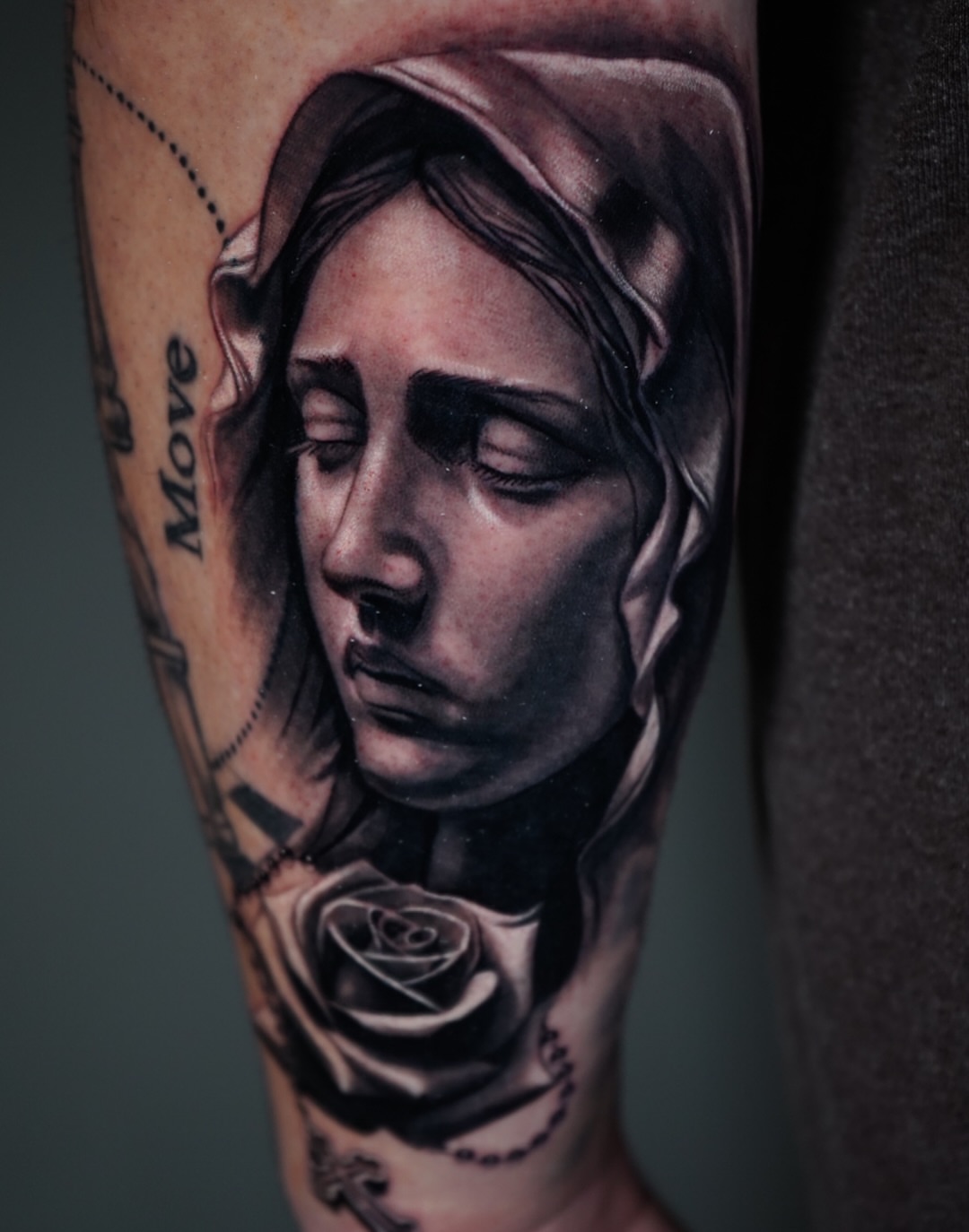 Woman with rose realism tattoo on the forearm by Benjamin Xavier Valadez