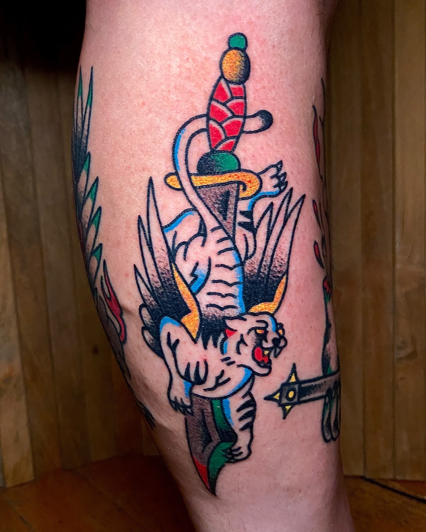 Elephant and rider American traditional tattoo on the leg by Daniel Diego