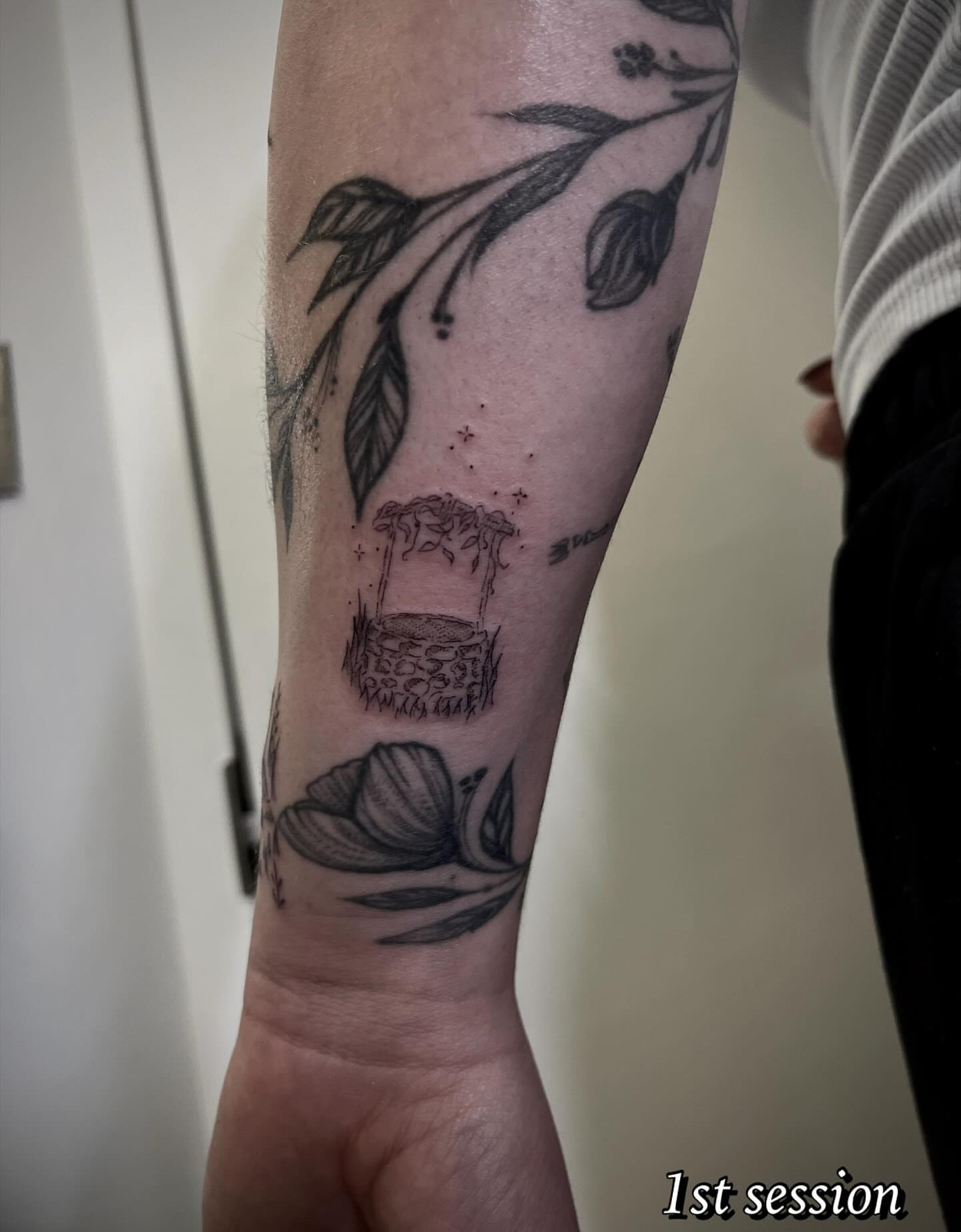 Flower basket black and grey tattoo on the forearm by Cat girl tattoo
