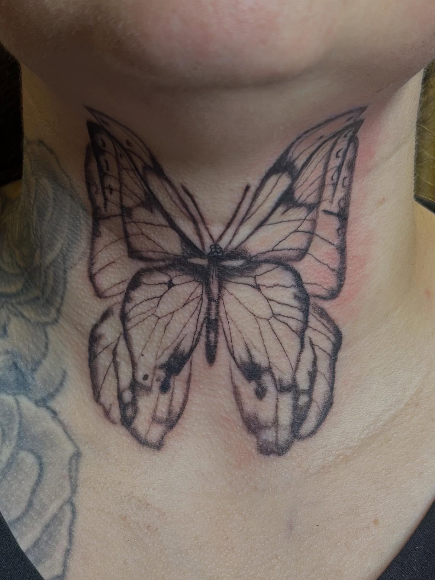 Butterfly black and grey tattoo on the neck by Joshua Ware, Alvarado, Texas
