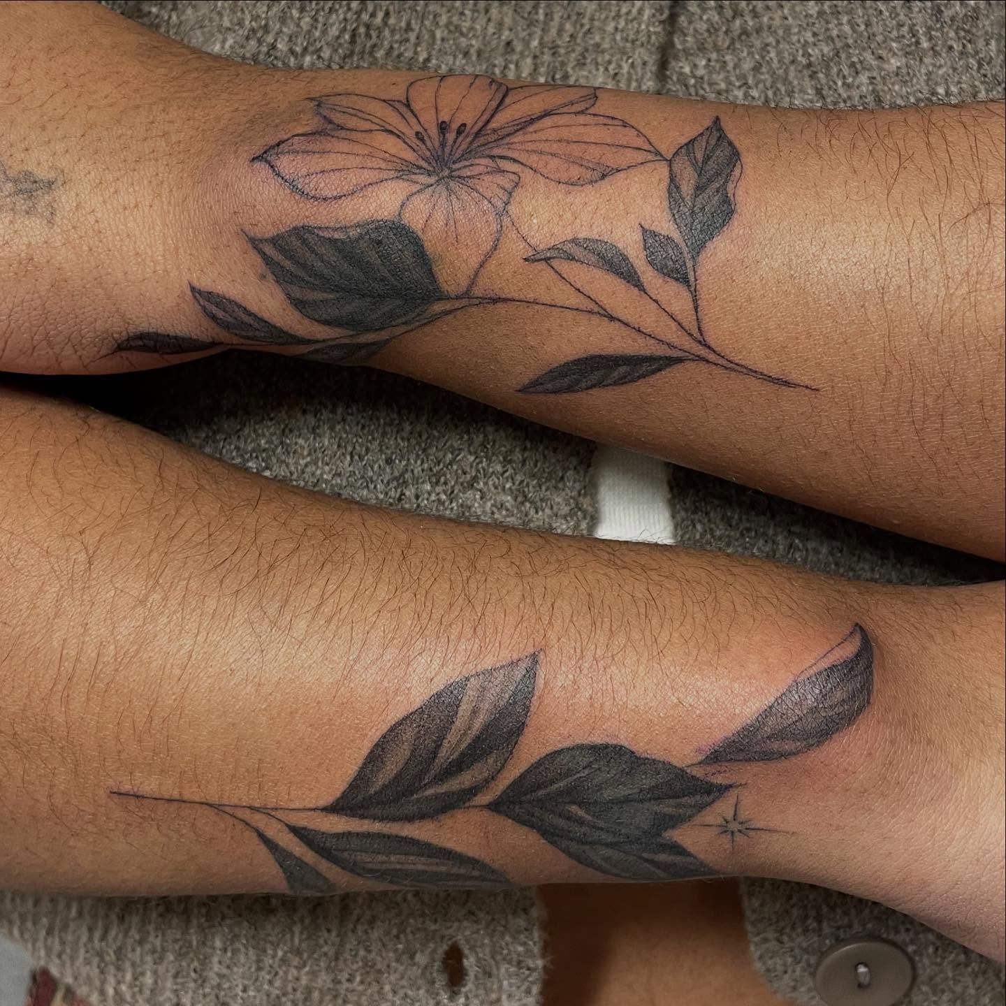 Flower and leaves black and grey tattoo on the forearm by Shamalee Delacruz✨