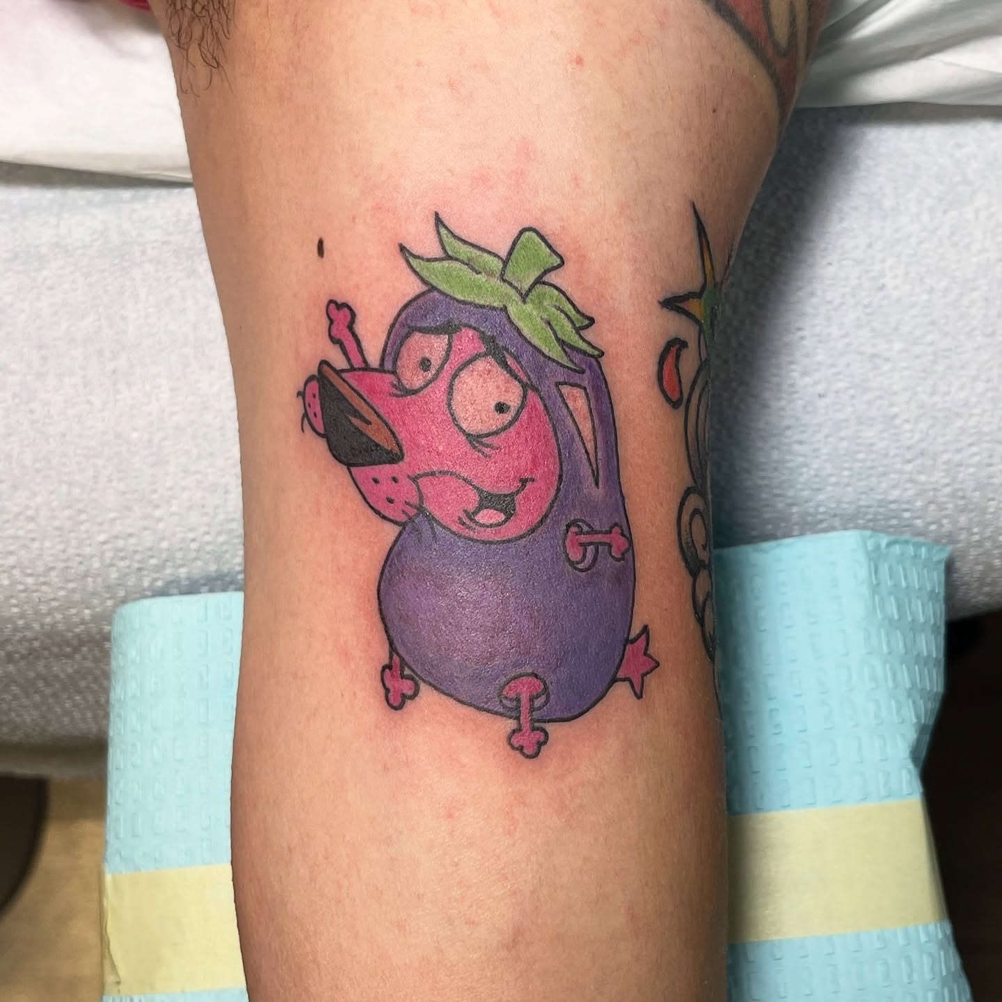 Eggplant character new school tattoo on the forearm by Ashley Antolin