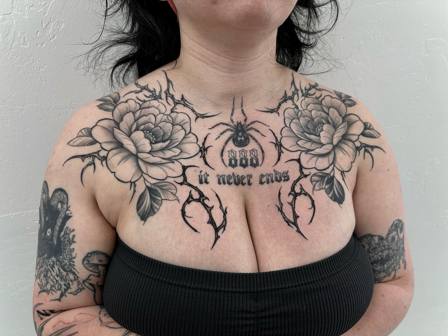 Spider and roses black and grey tattoo on the chest by Winters Ashurst - St. George tattoo artist