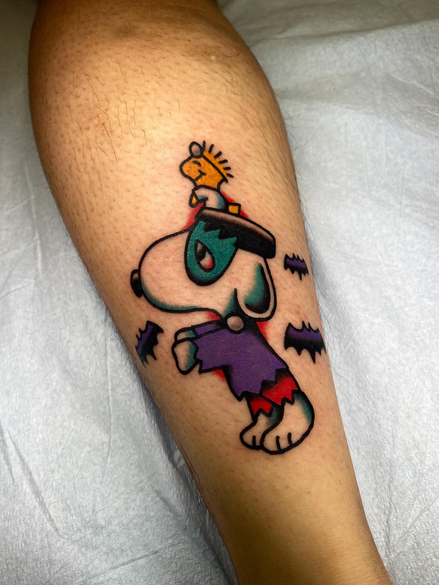 Snoopy halloween costume American traditional tattoo on the forearm by @rubber_band_dan, San Francisco, California
