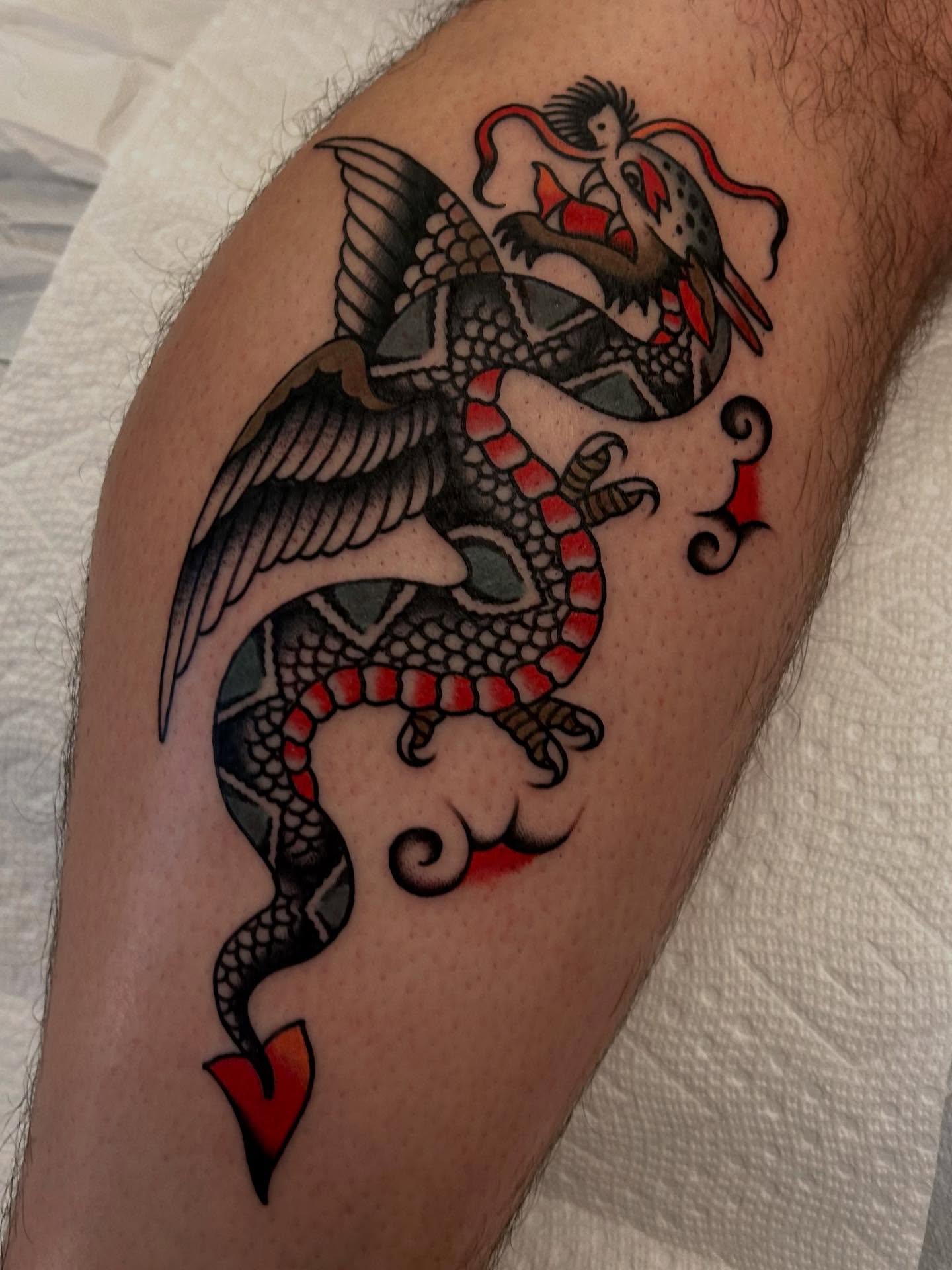 Dragon American traditional tattoo on the thigh by Christian Lasyone