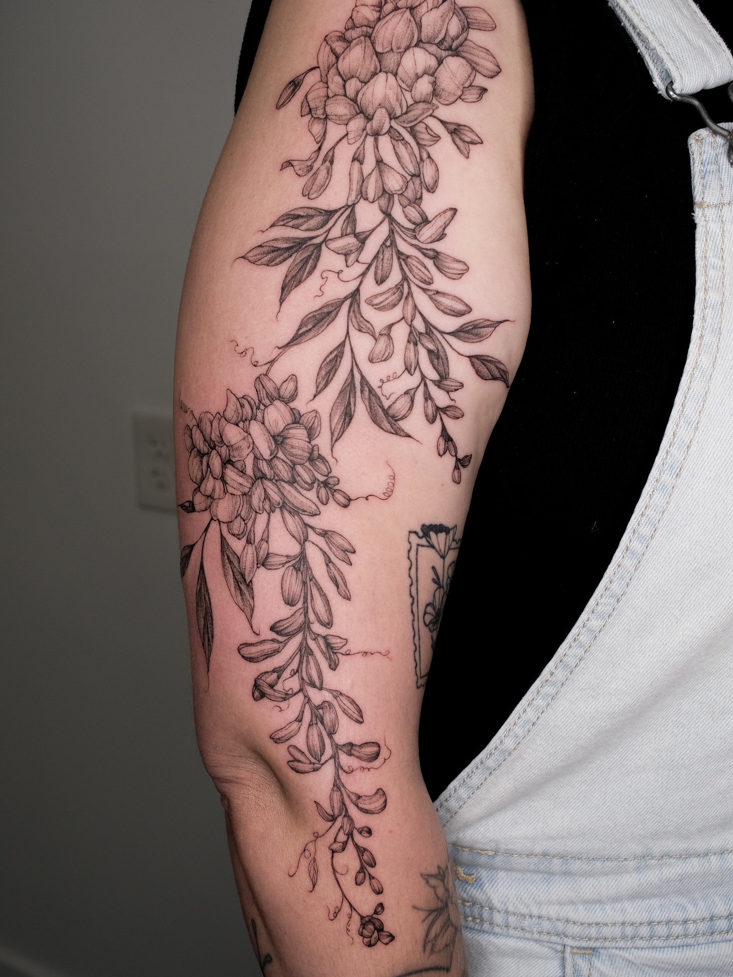 Wisteria black and grey tattoo on the forearm by Emma- Los Angeles Tattoo Artist