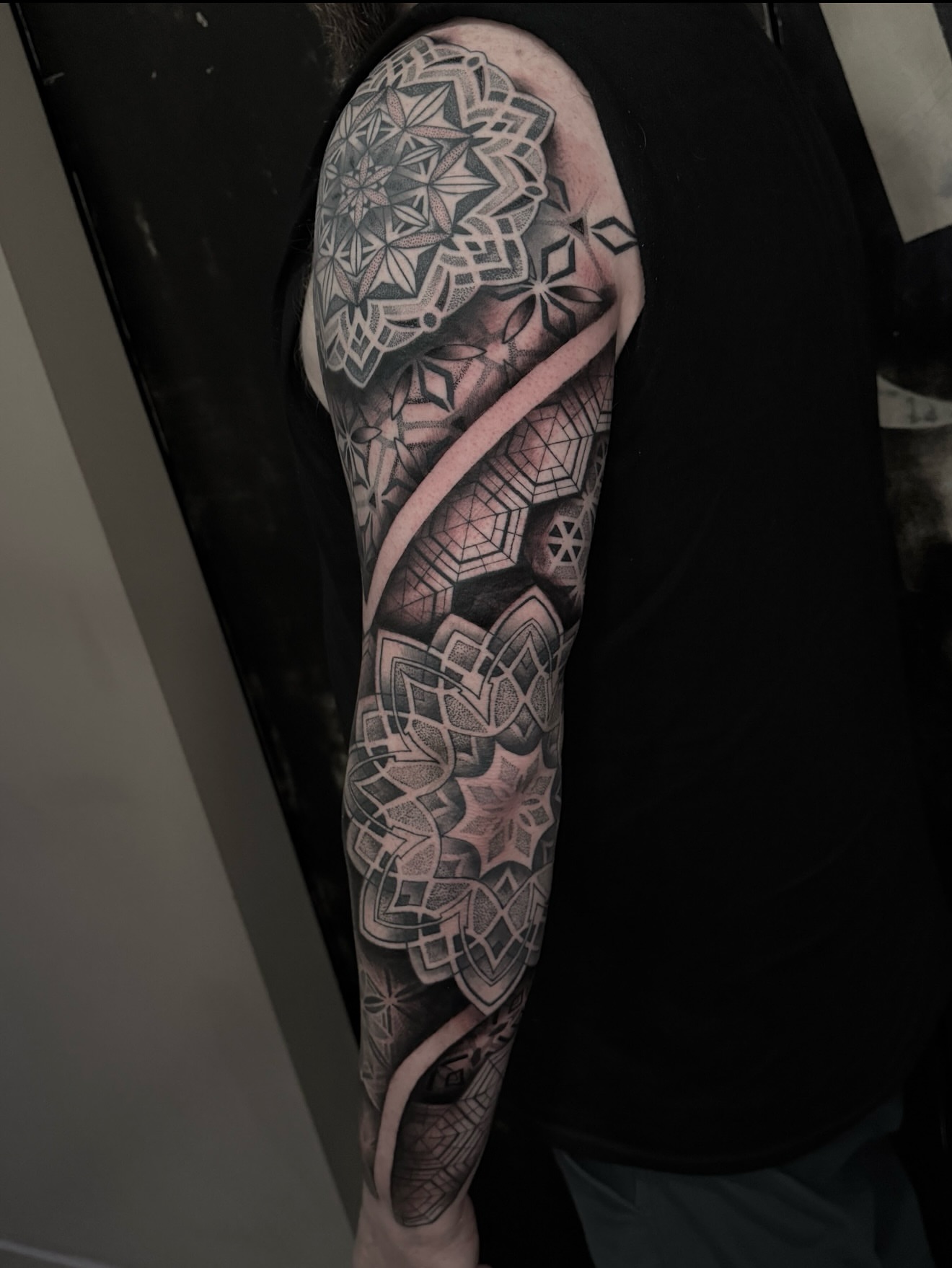 Geometric mandala geometric tattoo on the upper arm by Mel K Lockett - Nashville Tattoo Artist