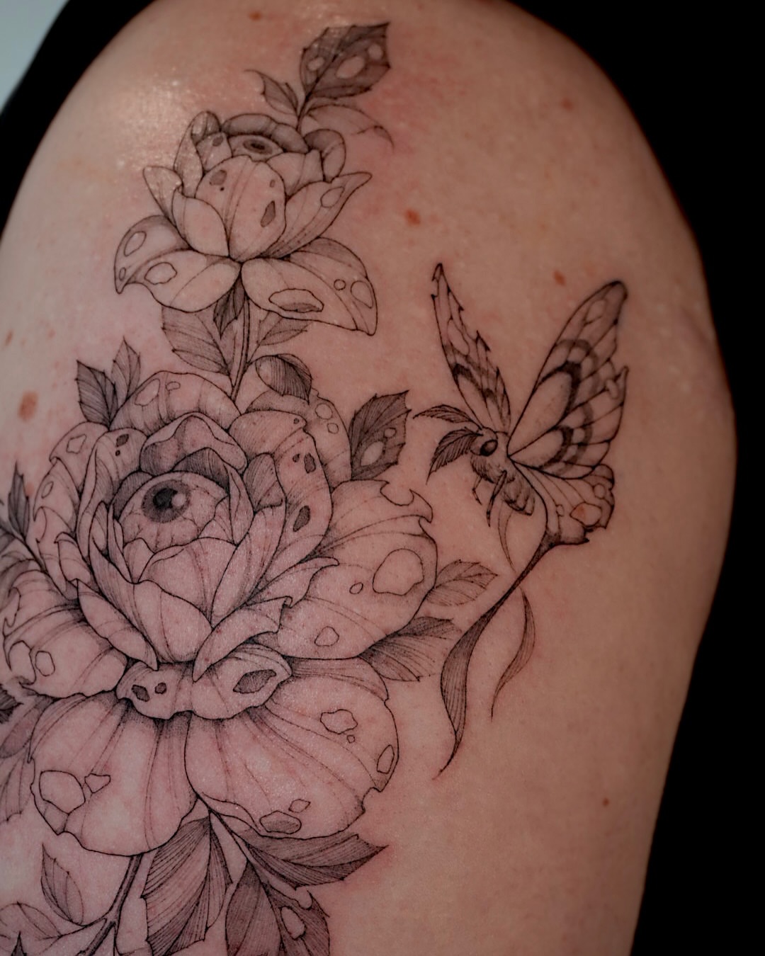 Peony and butterfly black and grey tattoo on the shoulder by Hyn[hin]
