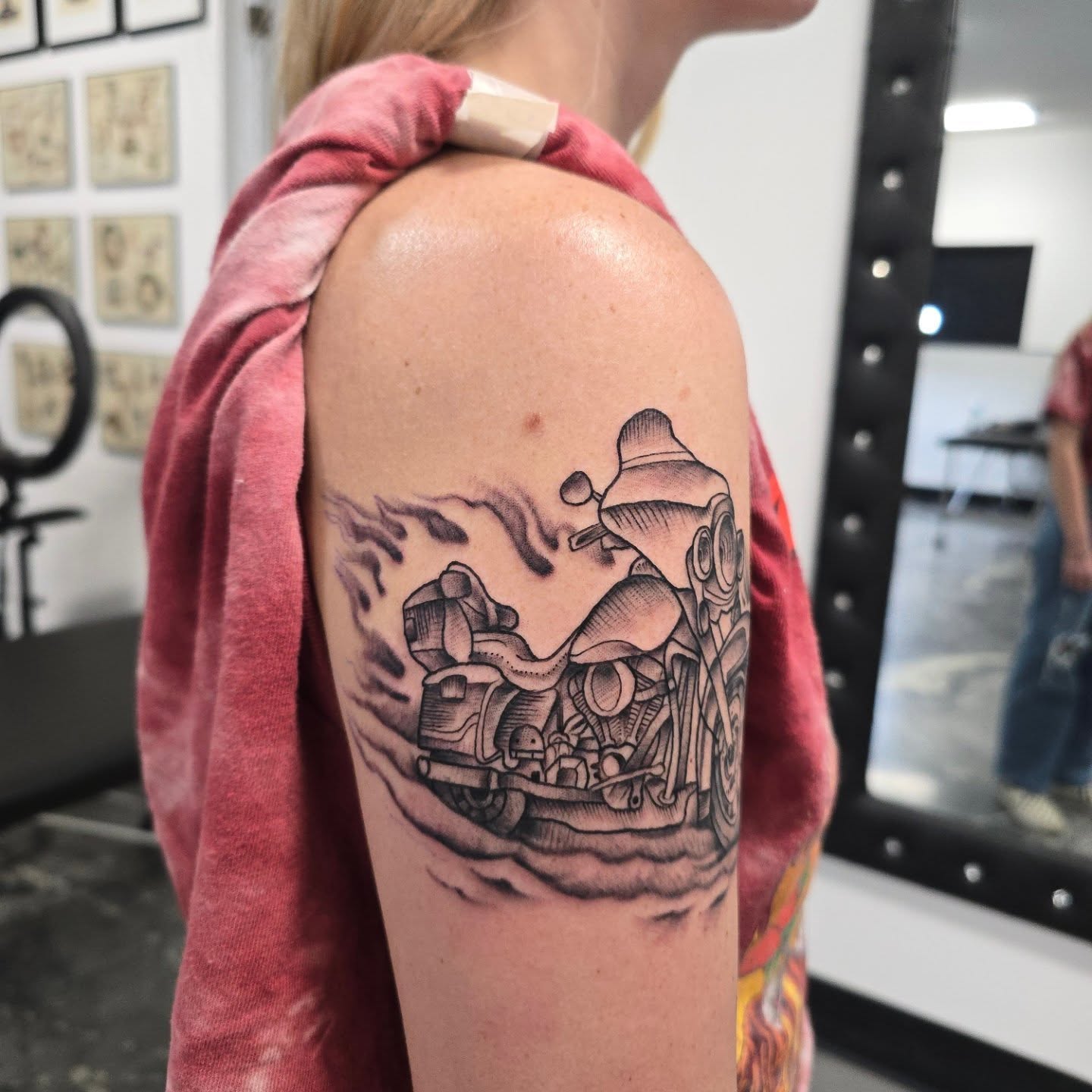 Motorcycle black and grey tattoo on the shoulder by Jon Griffin, Maryville, Tennessee