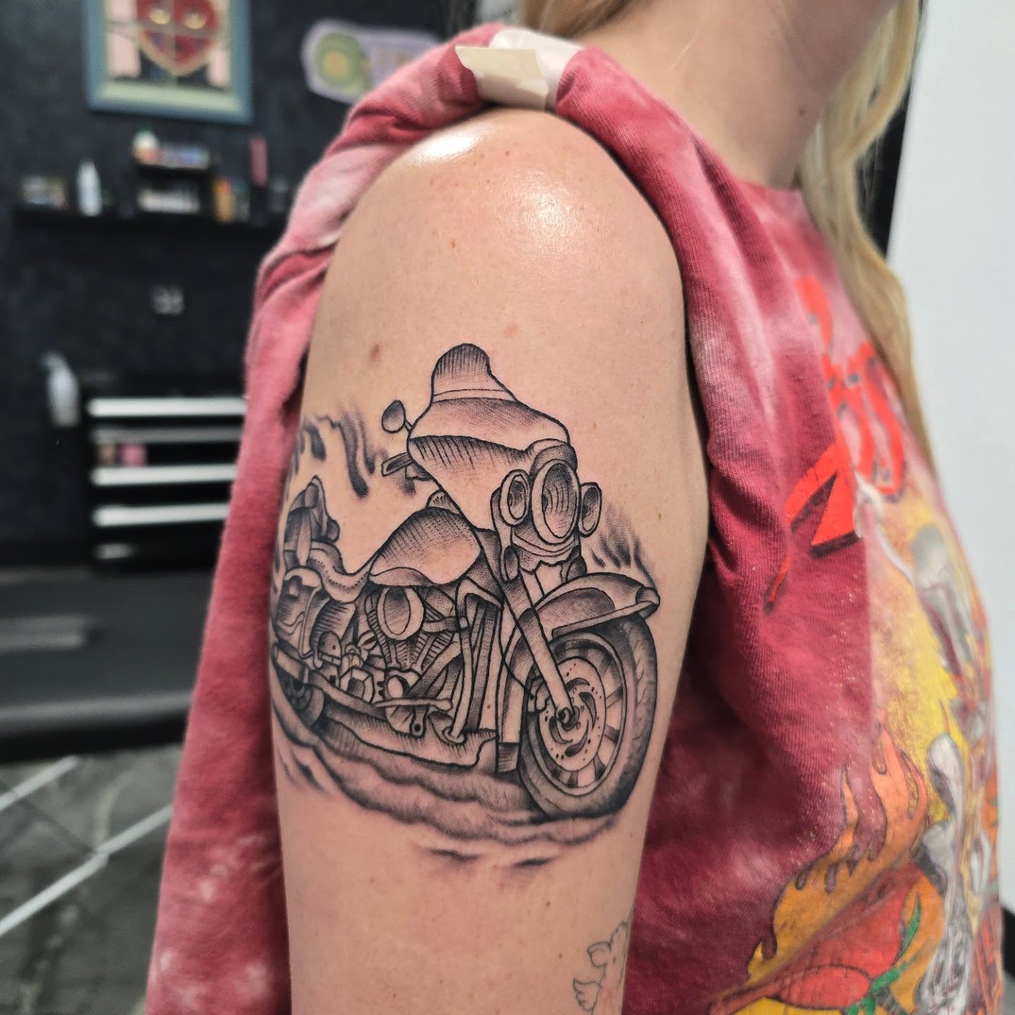 Motorcycle realism tattoo on the shoulder by Jon Griffin, Maryville, Tennessee
