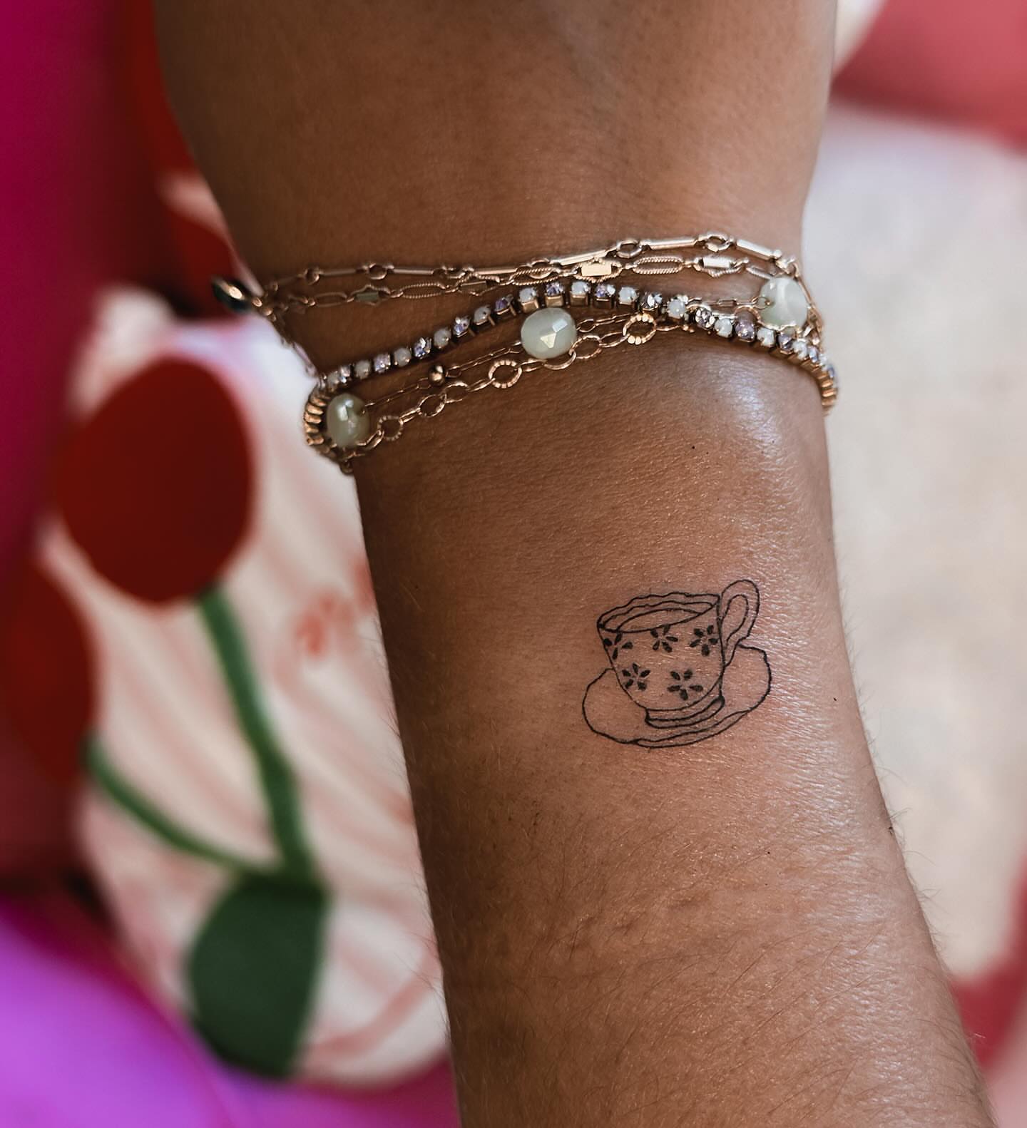 Teacup and saucer minimalist tattoo on the forearm by π»ππ π
ππππ Tattoo Artist, Las Vegas, Nevada