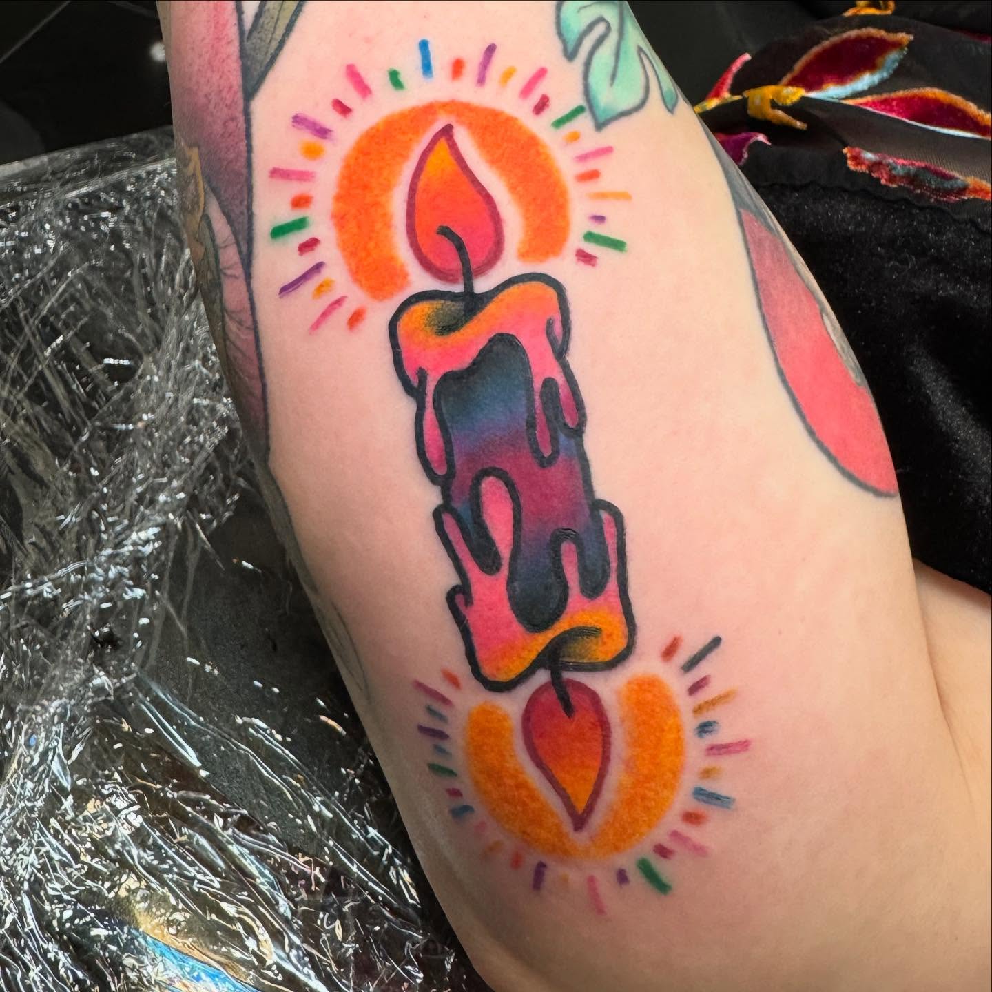 Candle new school tattoo on the forearm by Brian Herrera
