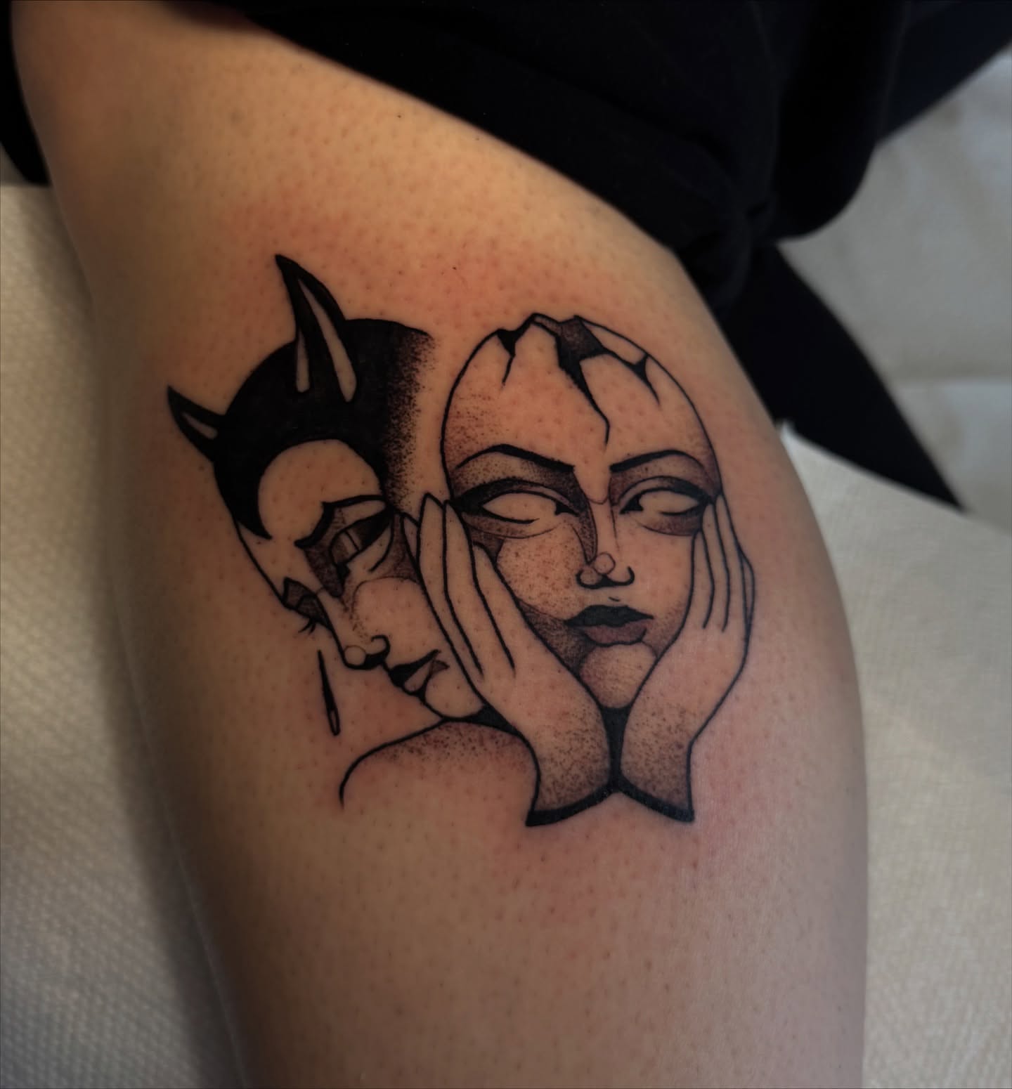Abstract faces dotwork tattoo on the thigh by Lauren Peltz