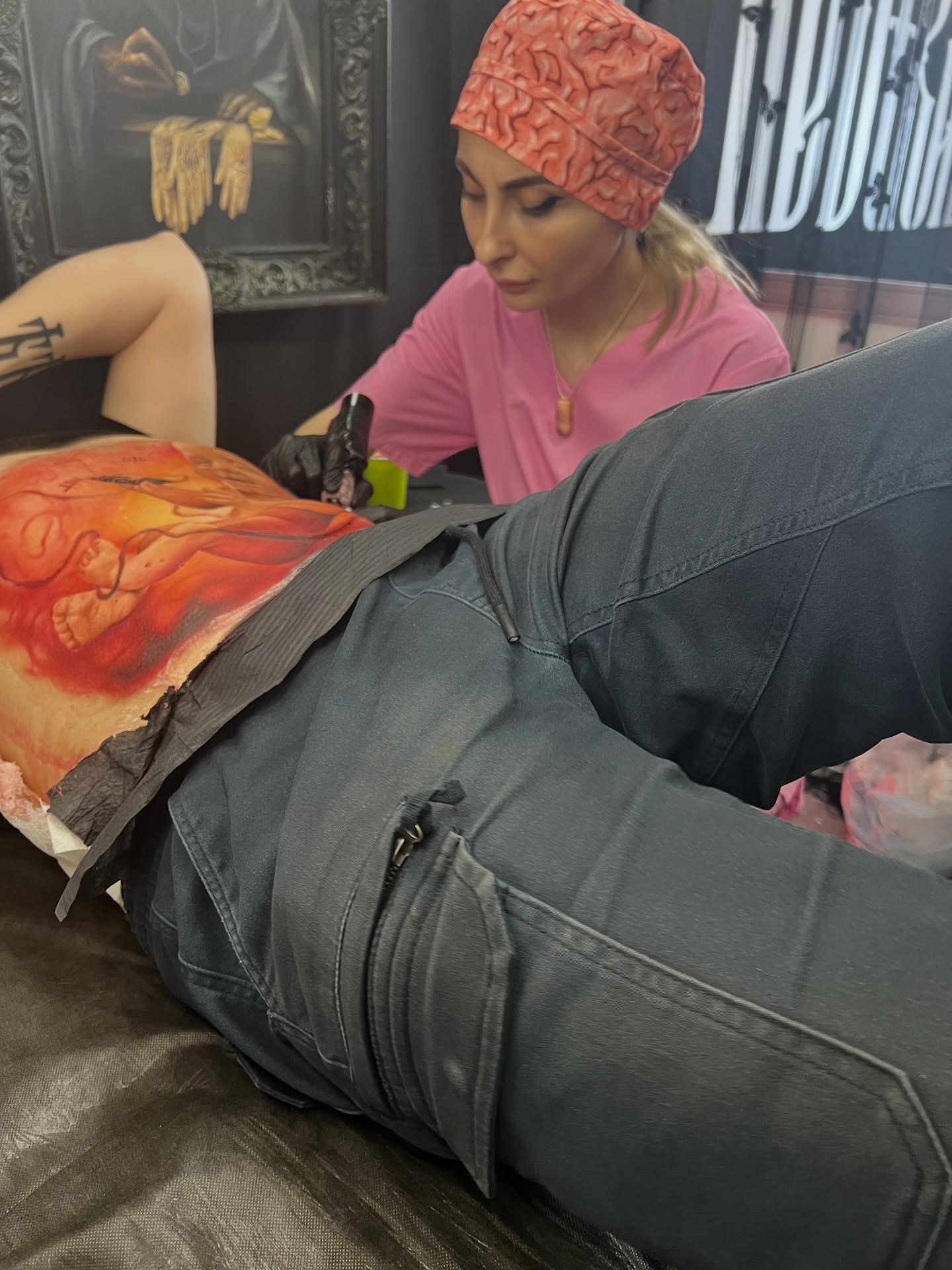 Lion and woman realism tattoo on the thigh by Sacramento tattoo