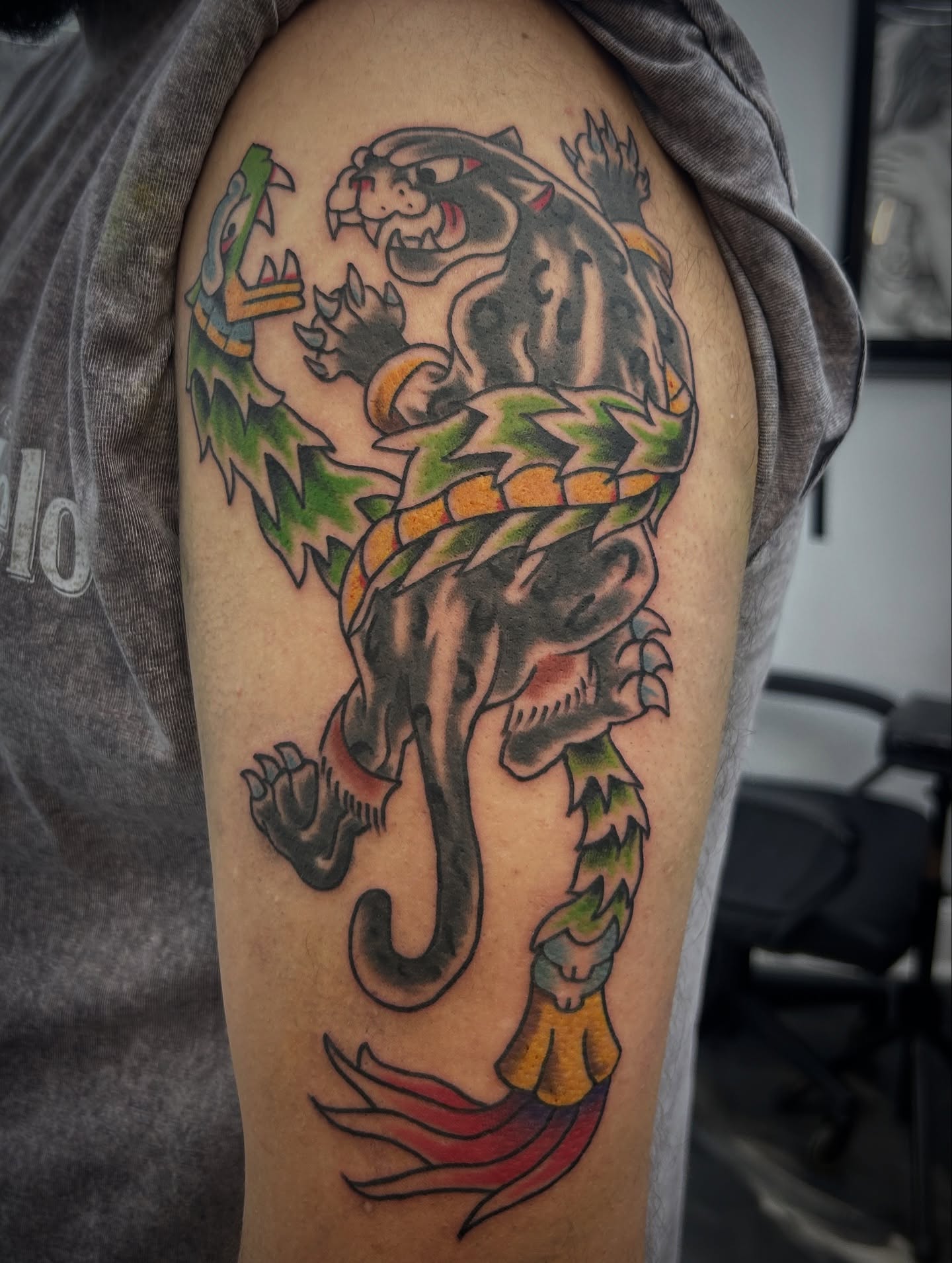 Dragon American traditional tattoo on the upper arm by キノ 🦊