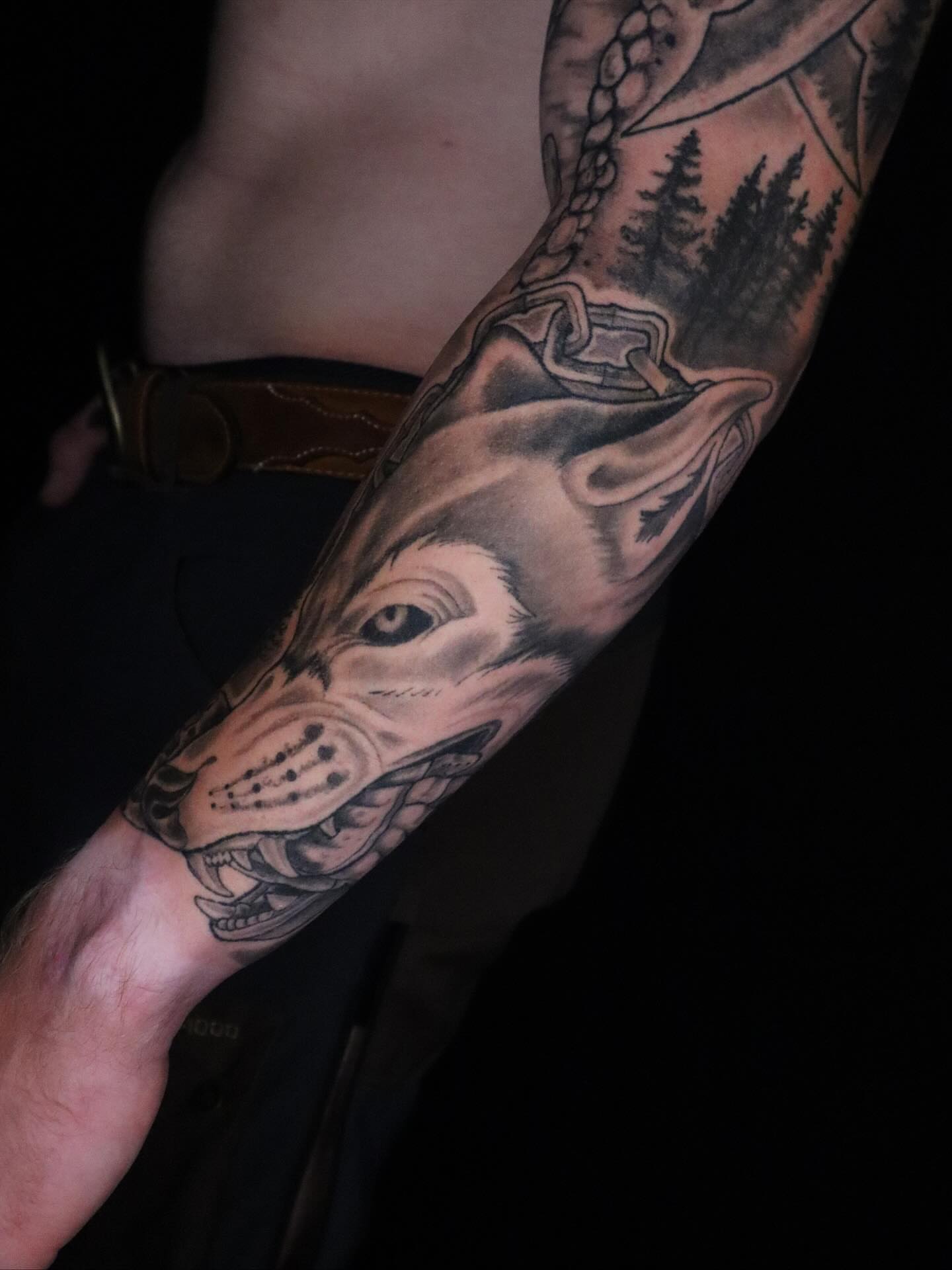 Wolf head realism tattoo on the forearm by Brandon Seven