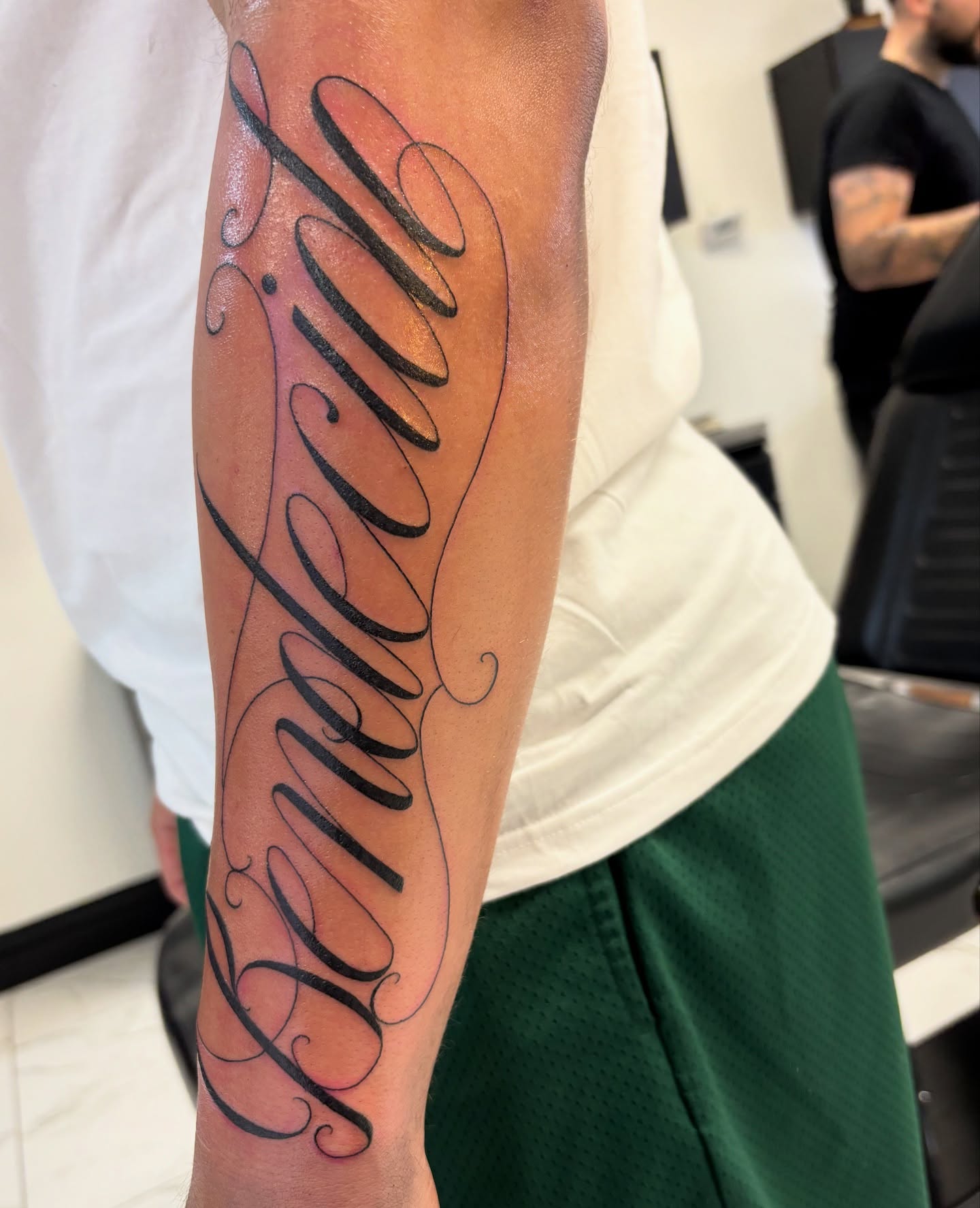 Script lettering lettering script tattoo on the forearm by Cristiano Ochoa, Elk Grove, California