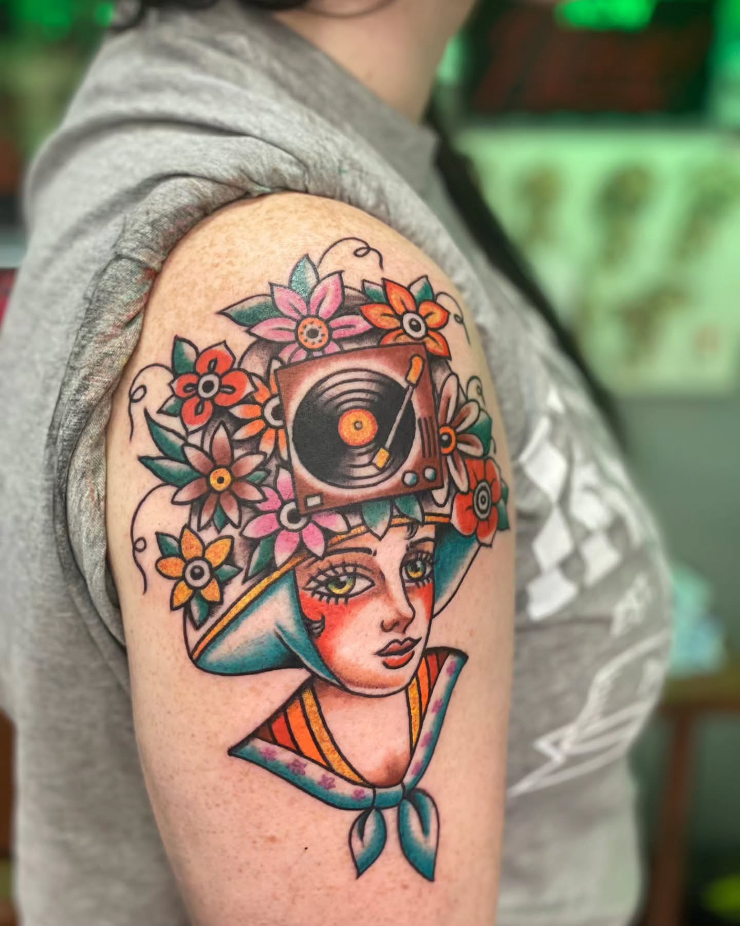 Record player woman American traditional tattoo on the shoulder by Austin Liebst, Wichita, Kansas