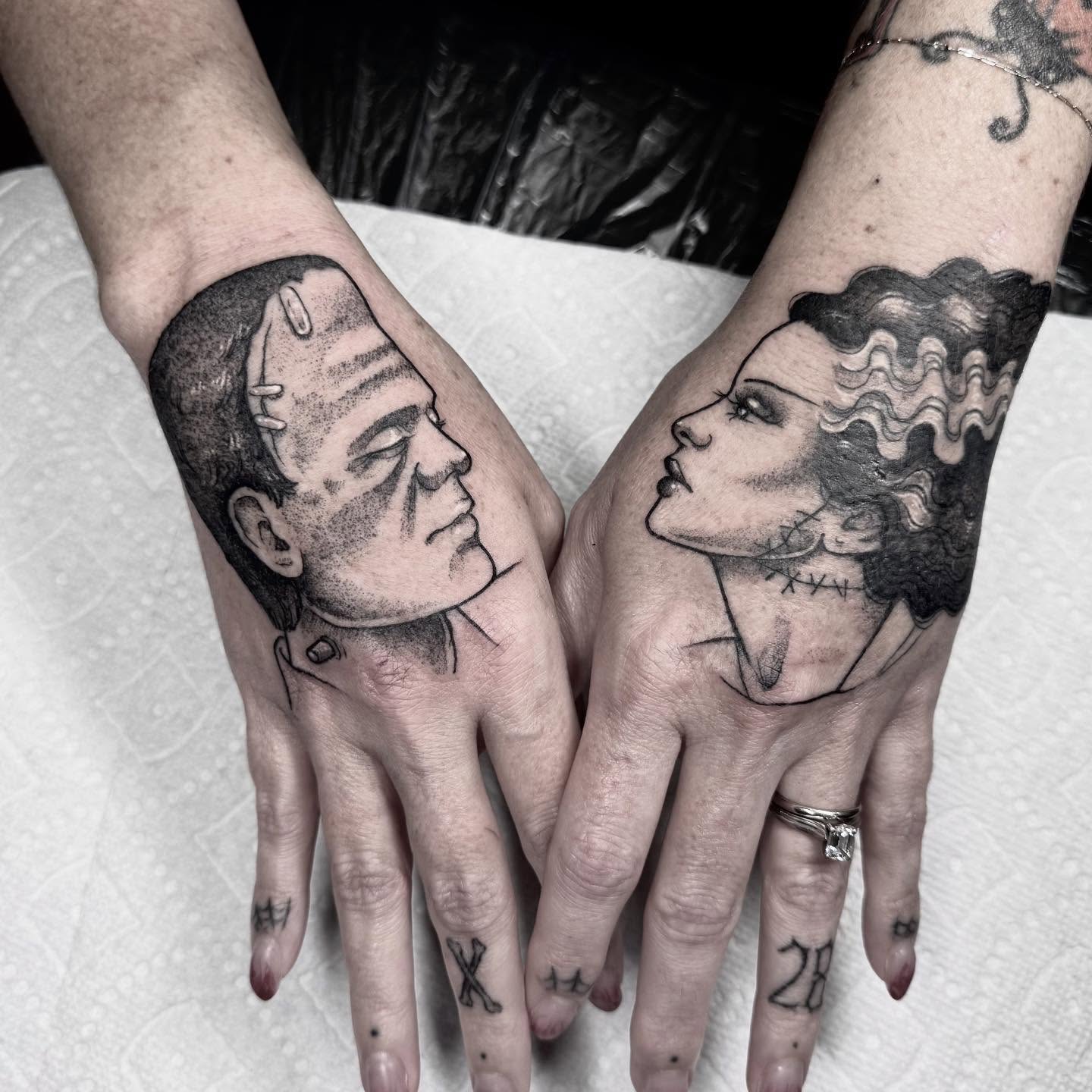 Frankenstein and Bride realism tattoo on the hand by Cincinnati