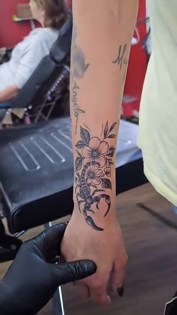 Scorpion and flowers tattoo fine line tattoo on the forearm by John Briceño, Columbus, Ohio