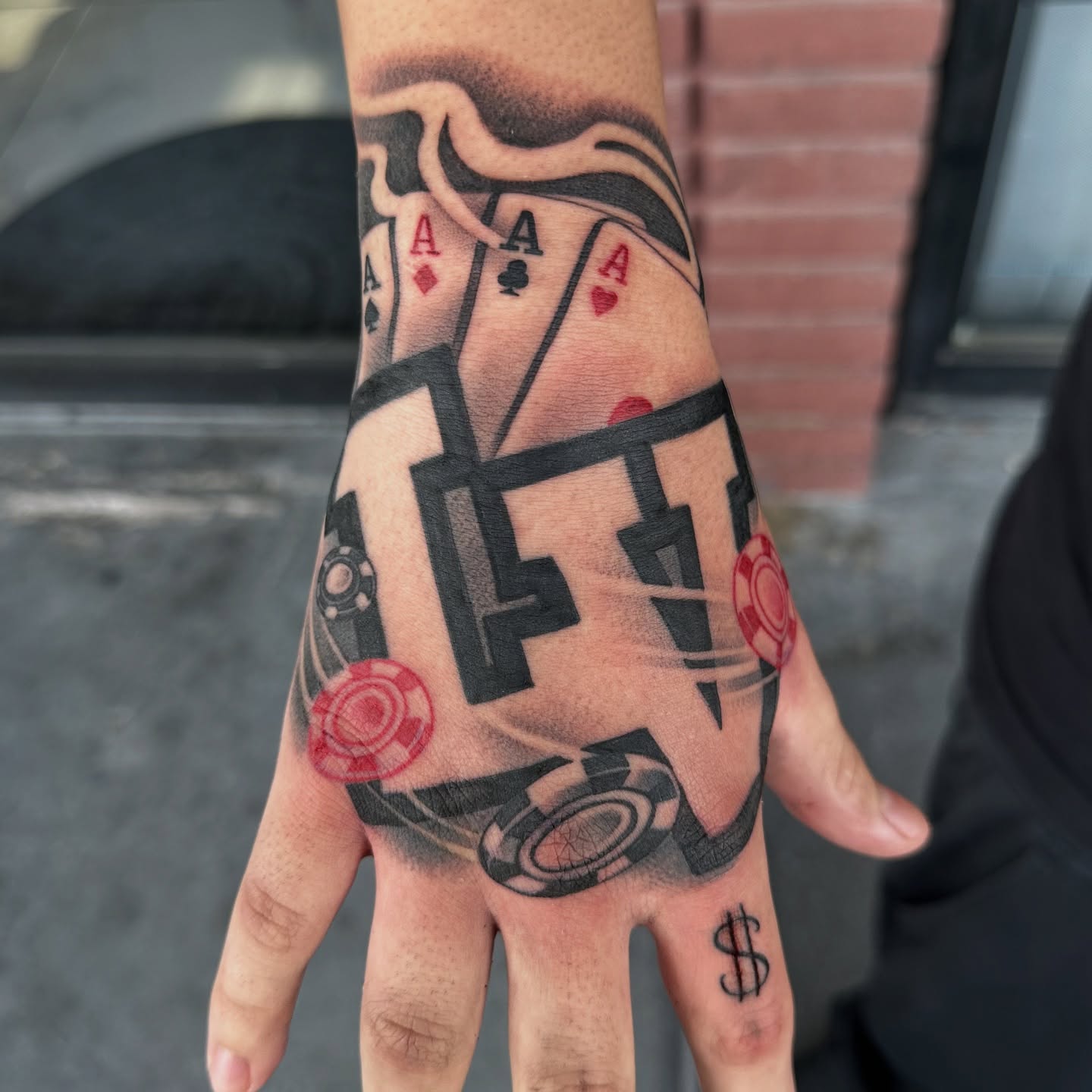 Playing cards and poker chips black and grey tattoo on the hand by Bigtoons21