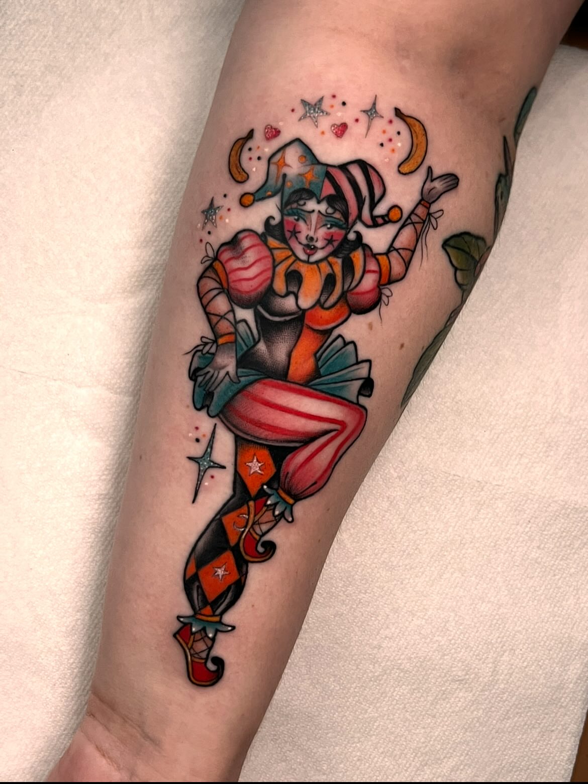 Jester American traditional tattoo on the forearm by 𝙻𝚒𝚊 𝙹𝚎𝚙𝚙𝚎𝚜𝚎𝚗