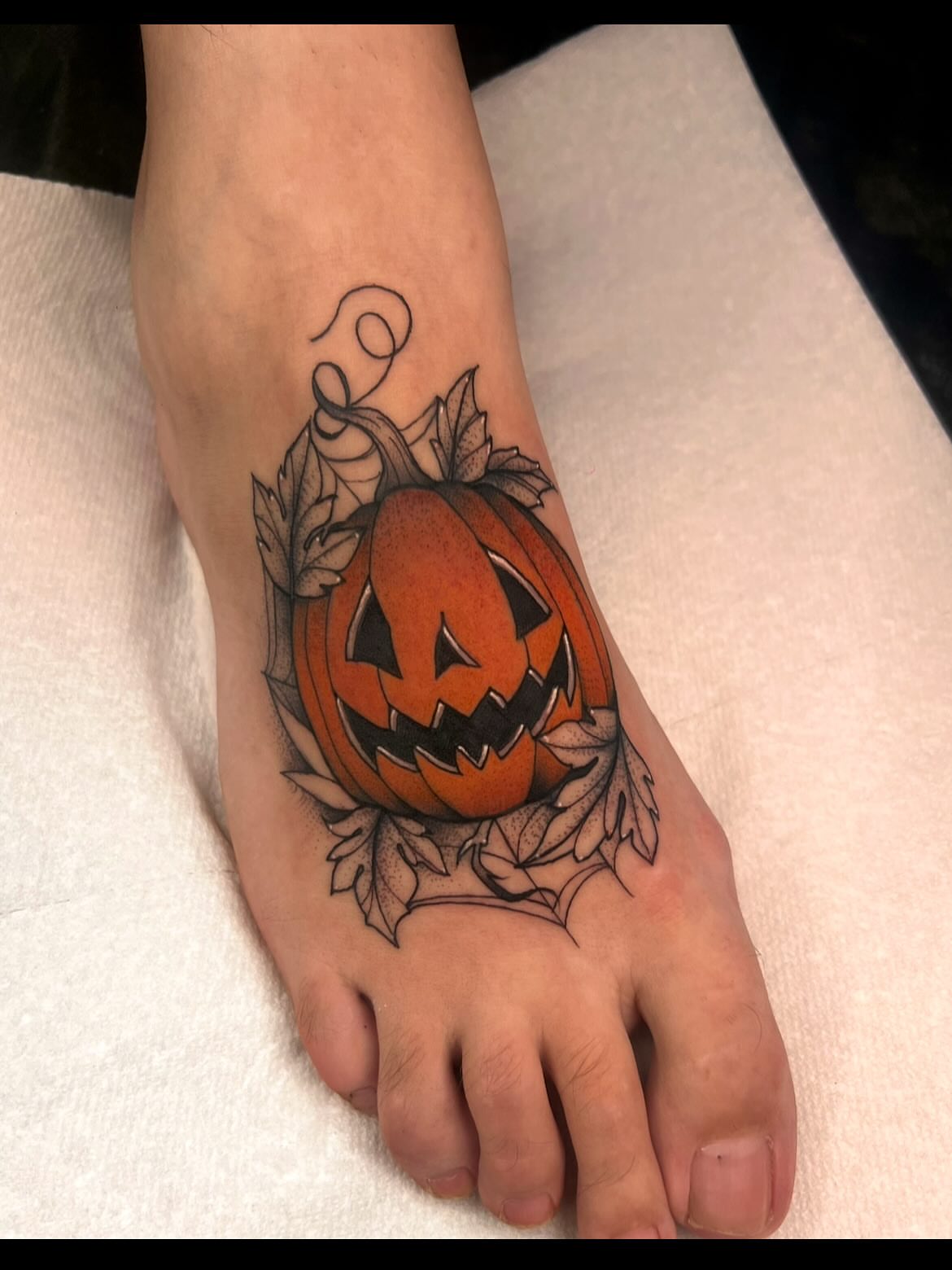 Pumpkin American traditional tattoo on the foot by 𝙻𝚒𝚊 𝙹𝚎𝚙𝚙𝚎𝚜𝚎𝚗