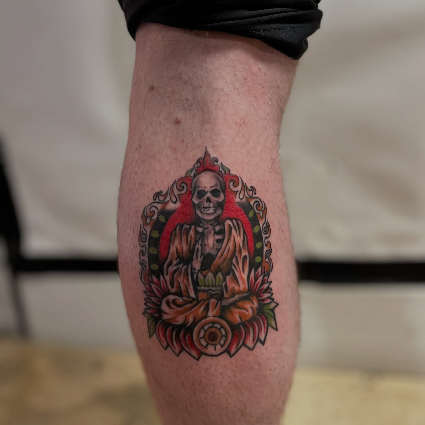 Skeleton in lotus pose American traditional tattoo on the thigh by ✨ Chris ✨