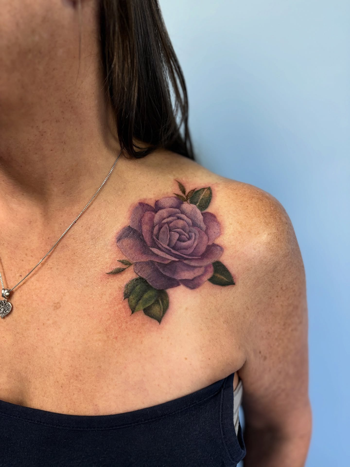 Purple rose realism tattoo on the shoulder by Jessica McKinley Tattoo Artist