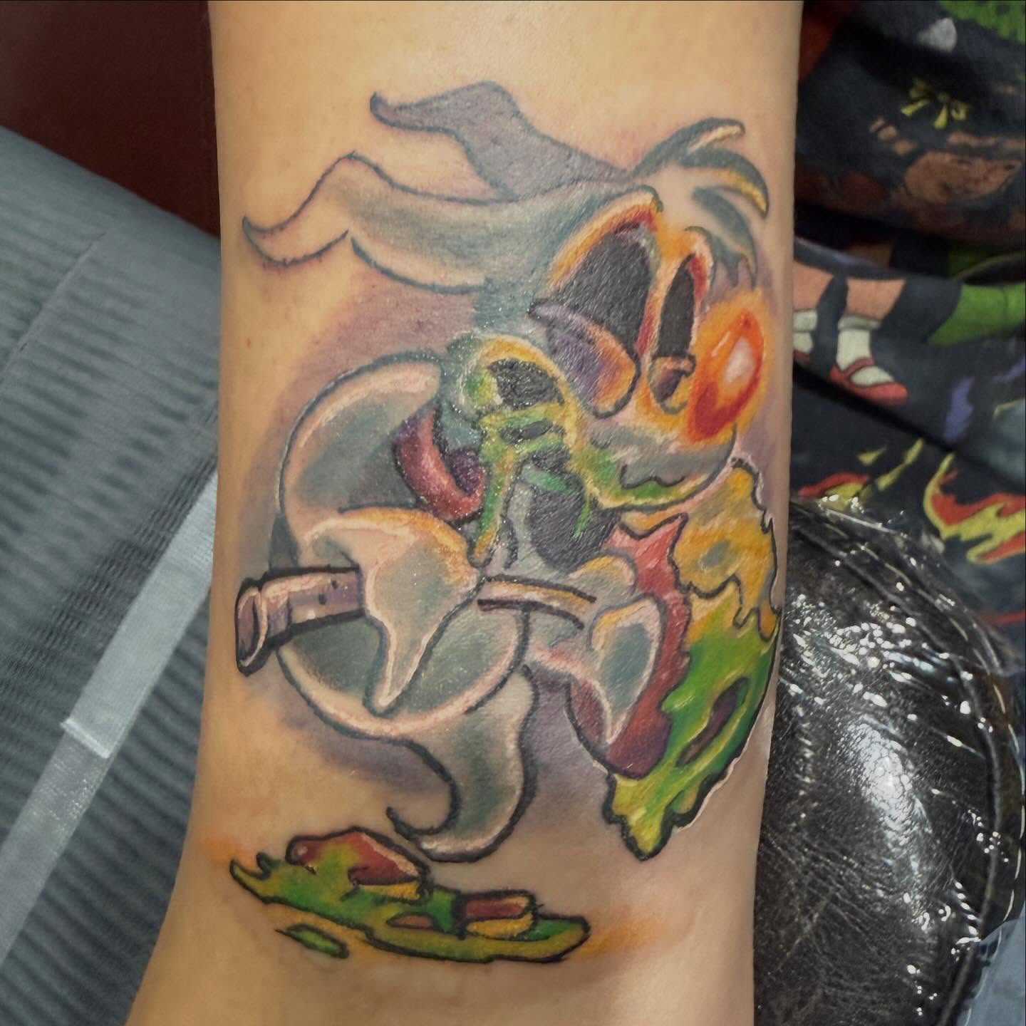 Phantom with trumpet American traditional tattoo on the forearm by Devon Beyer, Mission, Kansas