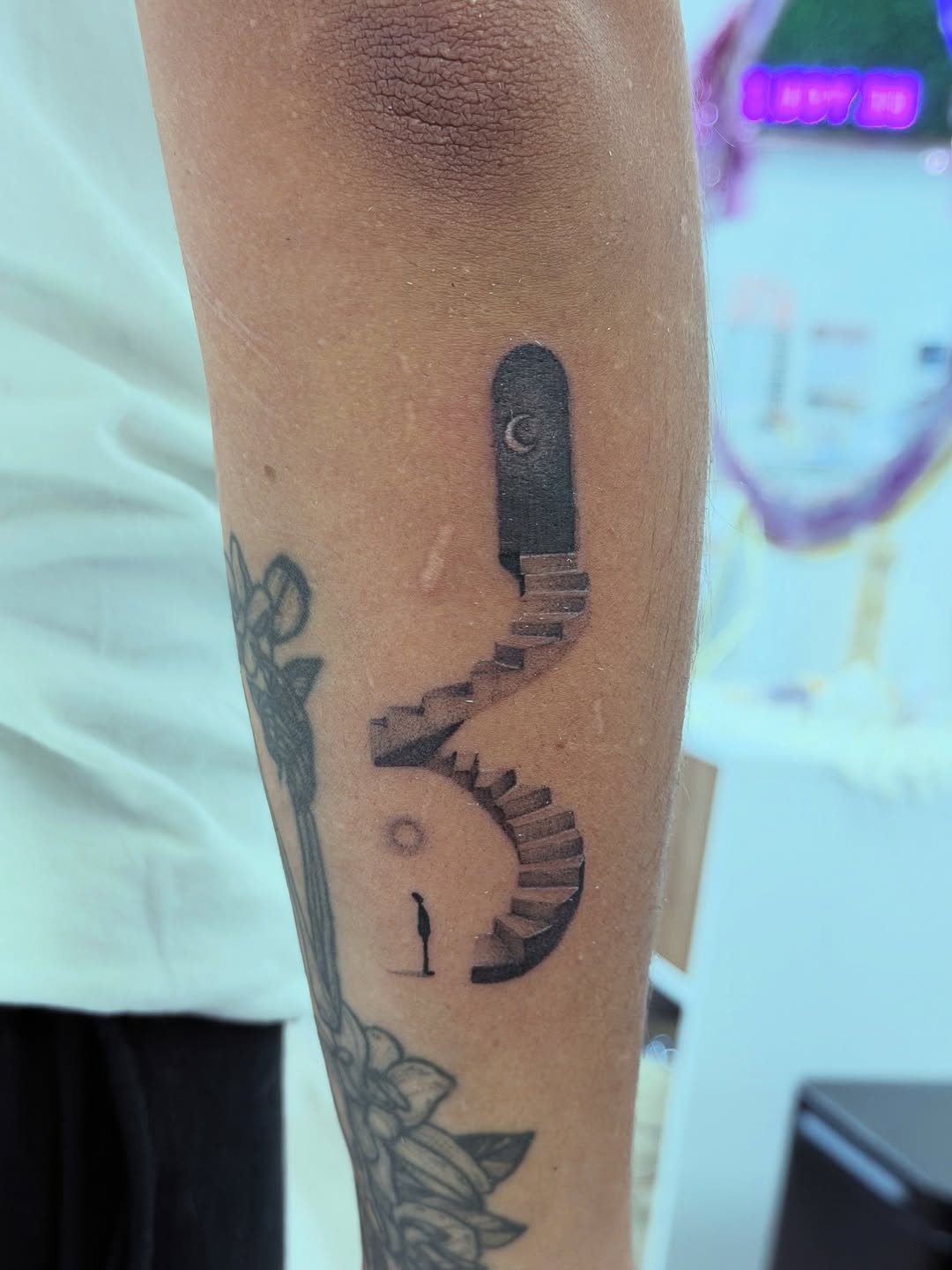 Surrealism tattoo on the forearm by Ink About Me - Amanda’s Fine Lines