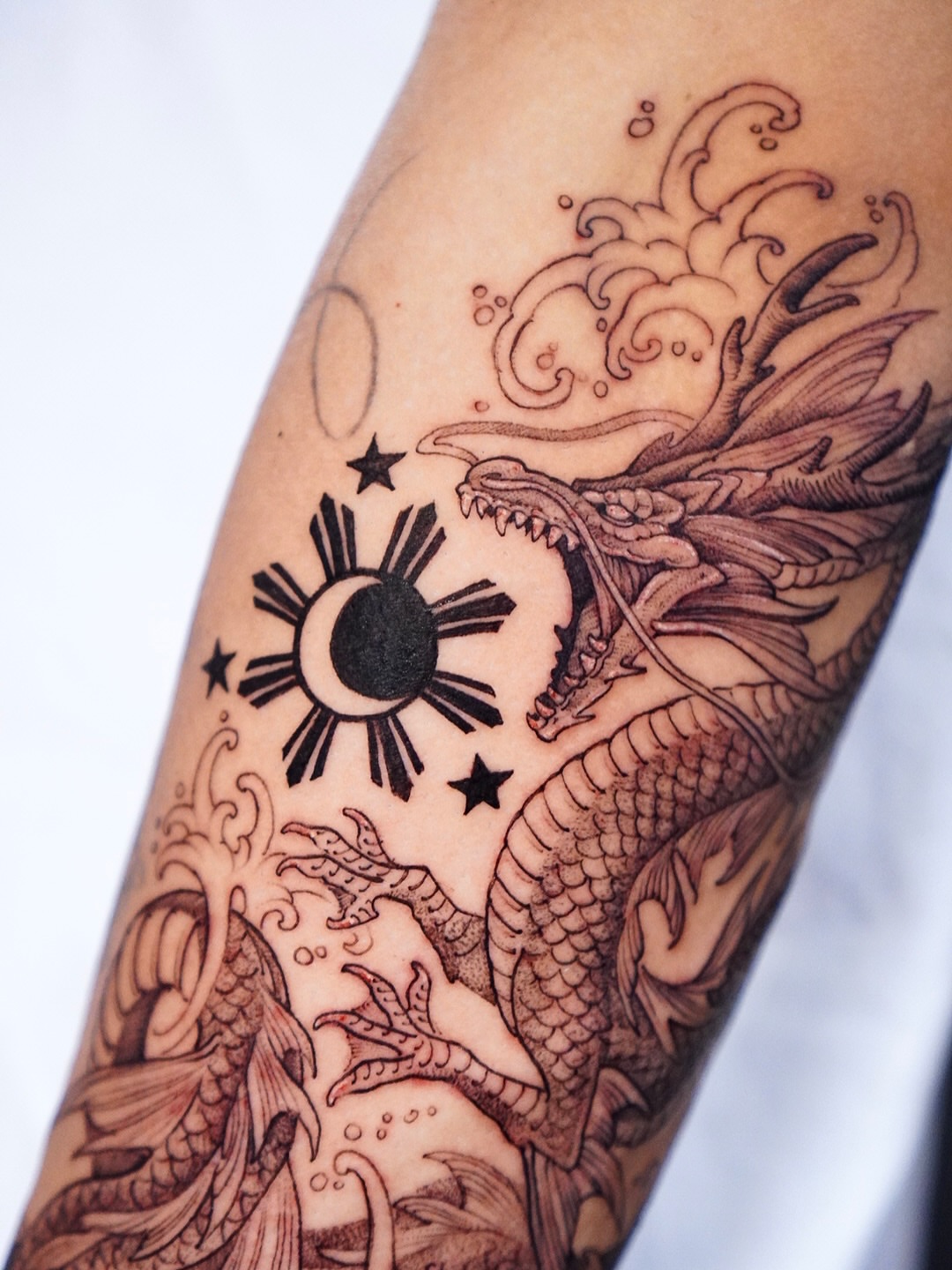Dragon and sun black and grey tattoo on the forearm by 🌛 Lê Huỳnh🌜, Dallas, Texas