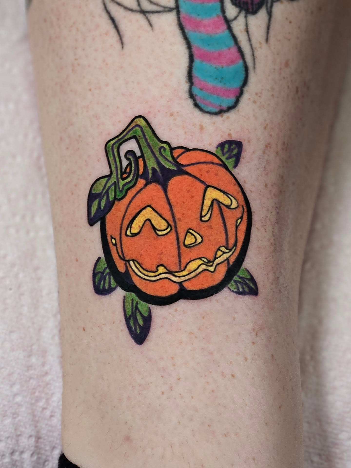 Pumpkin American traditional tattoo on the forearm by Bellz Rehder