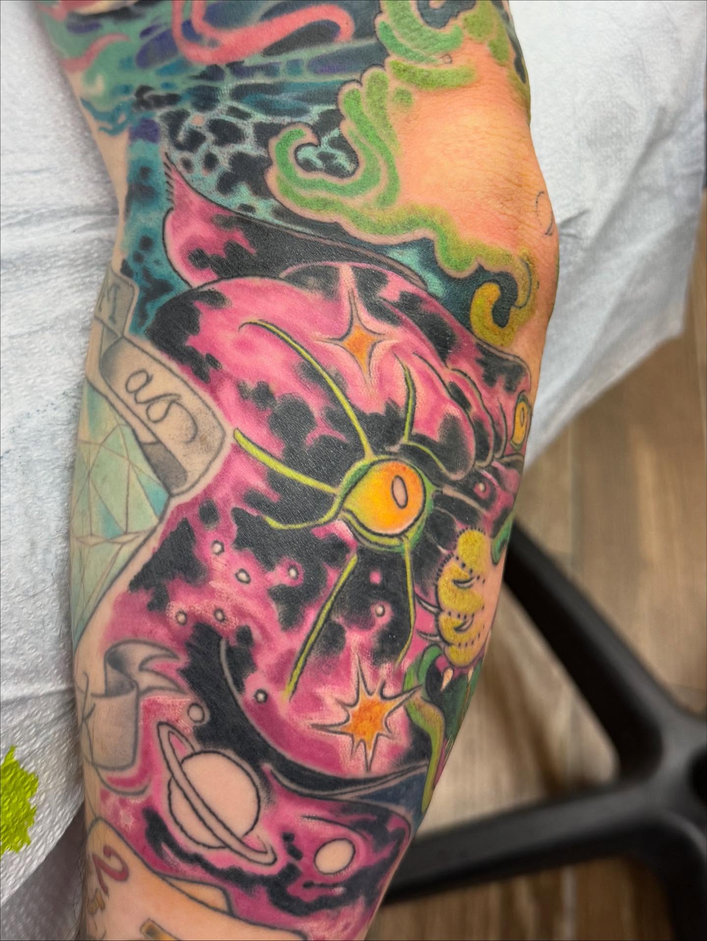 Astronaut new school tattoo on the forearm by Hori Bensei, Charlottesville, Virginia