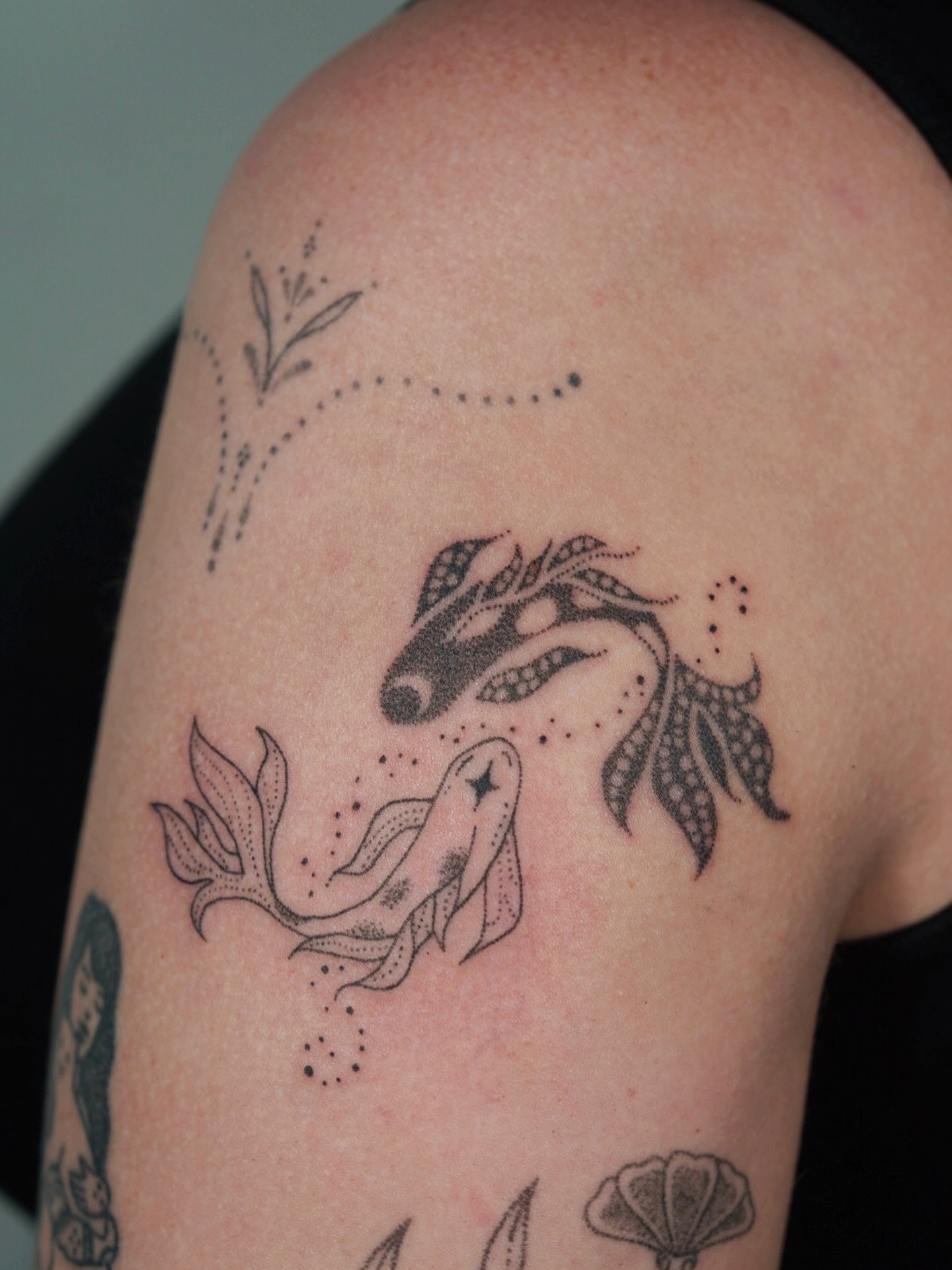 Mermaid dotwork tattoo on the shoulder by IVY K ༄ ATX Handpoke Artist
