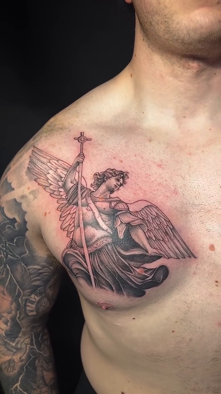 Angel with sword and cross realism tattoo by Mo Dinero🎰