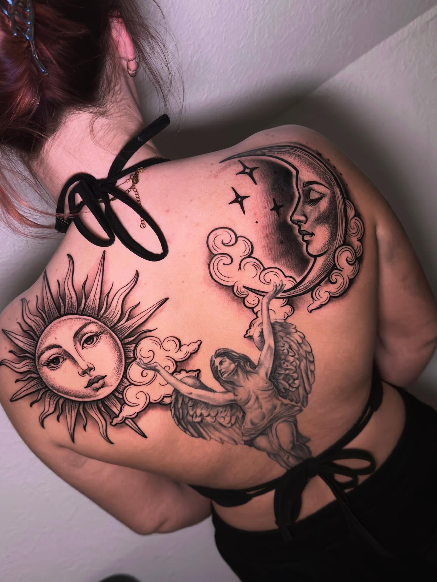 Sun and moon realism tattoo on the shoulder by Eric Zuluaga