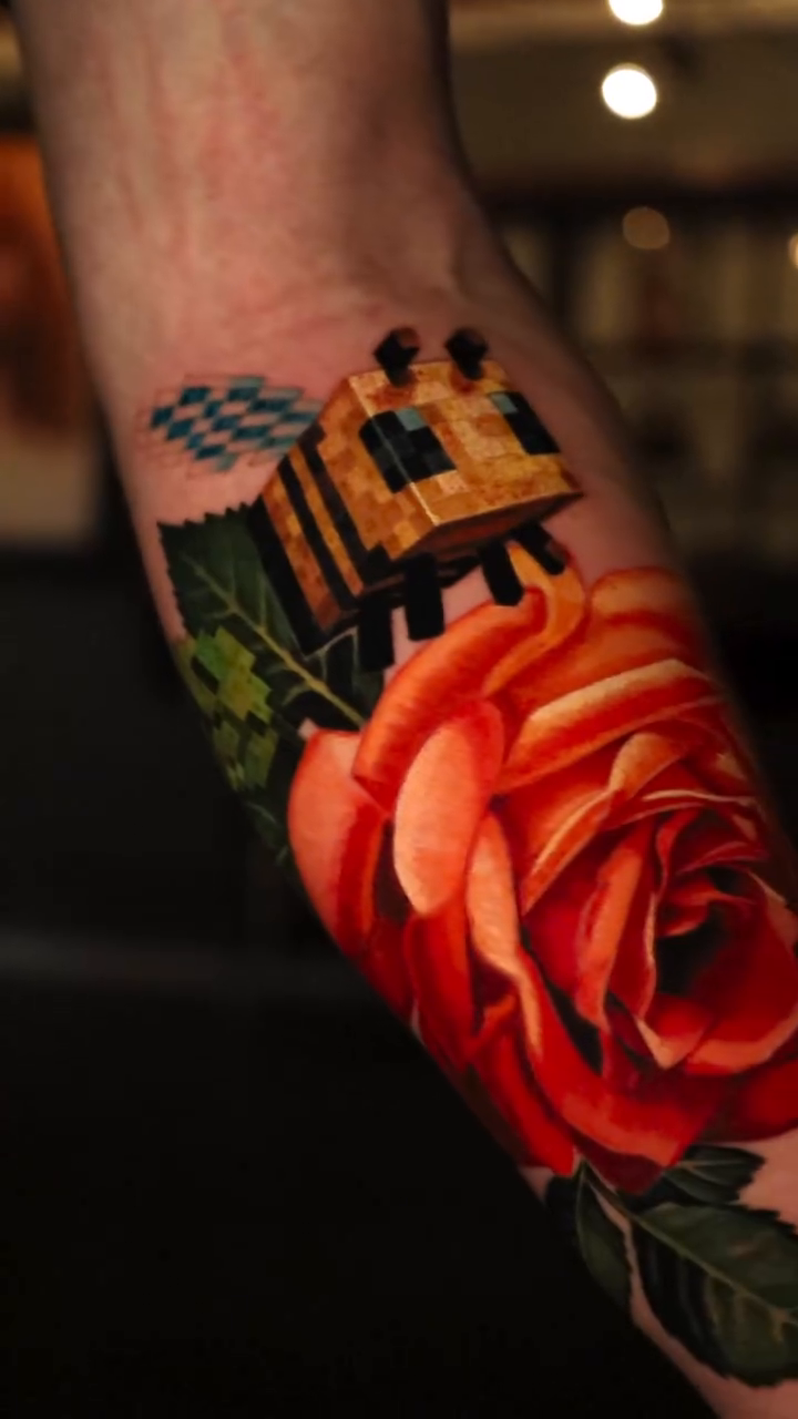 Rose with a building realism tattoo by Bryan Palacios