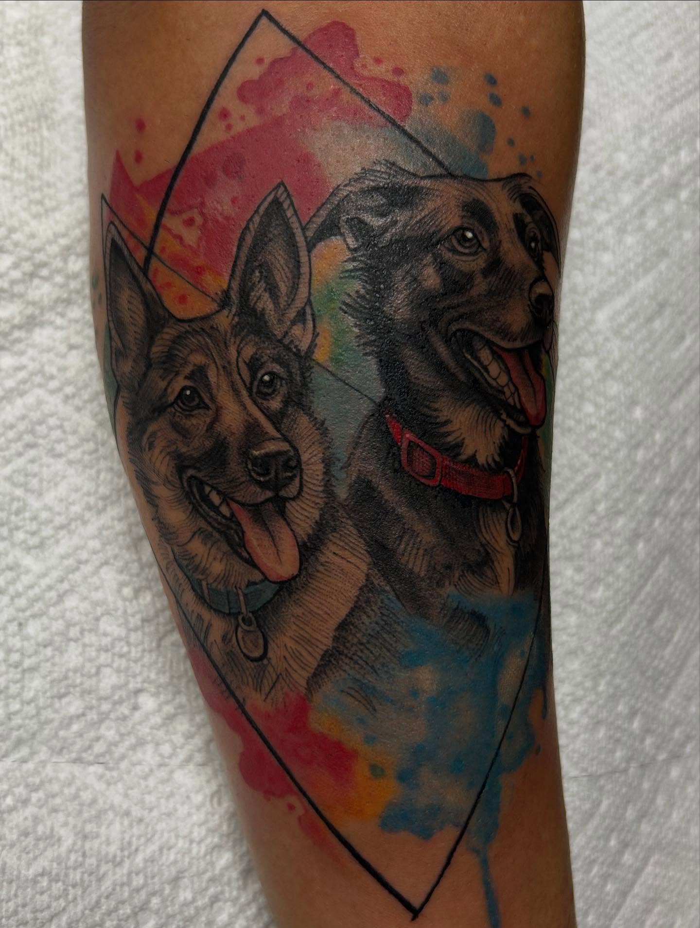Dogs watercolor tattoo on the forearm by Tiffany Vargas