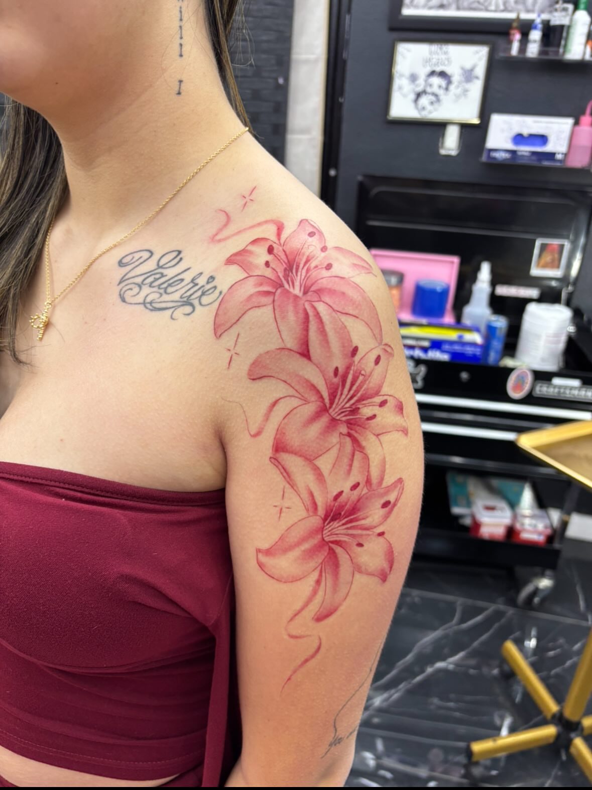 Lilies realism tattoo on the shoulder by $weet little leslie 🩶🧚🏻‍♀️